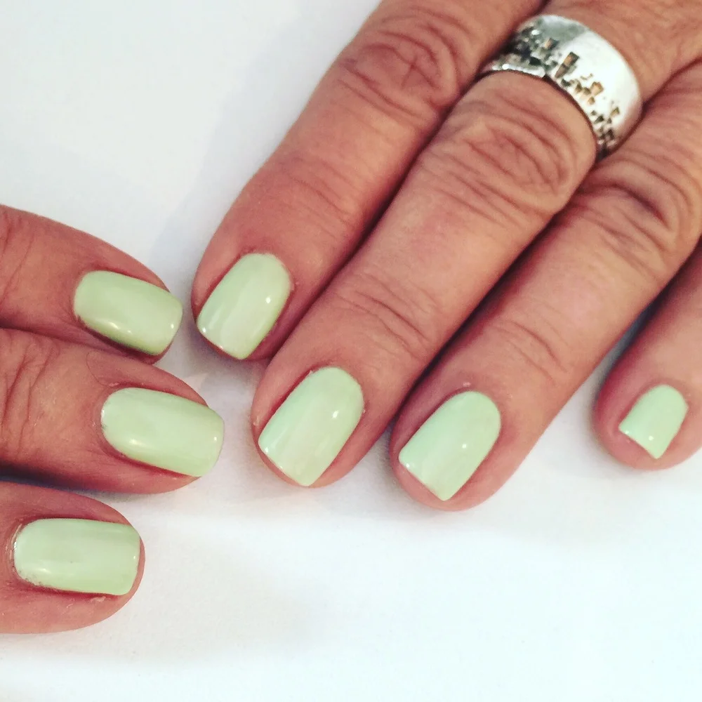 Pretty nails complete an interesting outfit. Loving this gellux green this summer.
