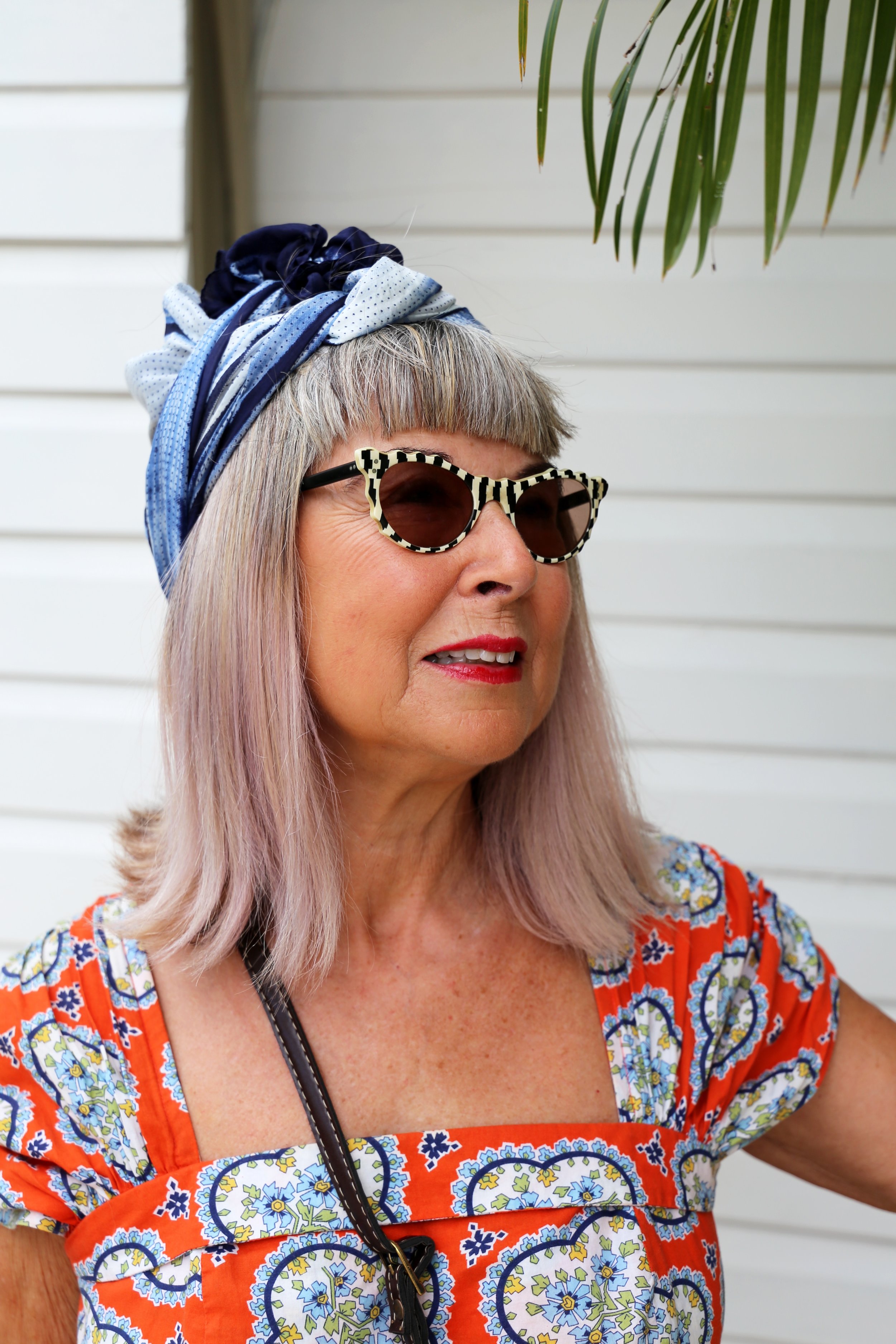 Blue Silk Shibori striped scarf by East. Vintage sunnies.