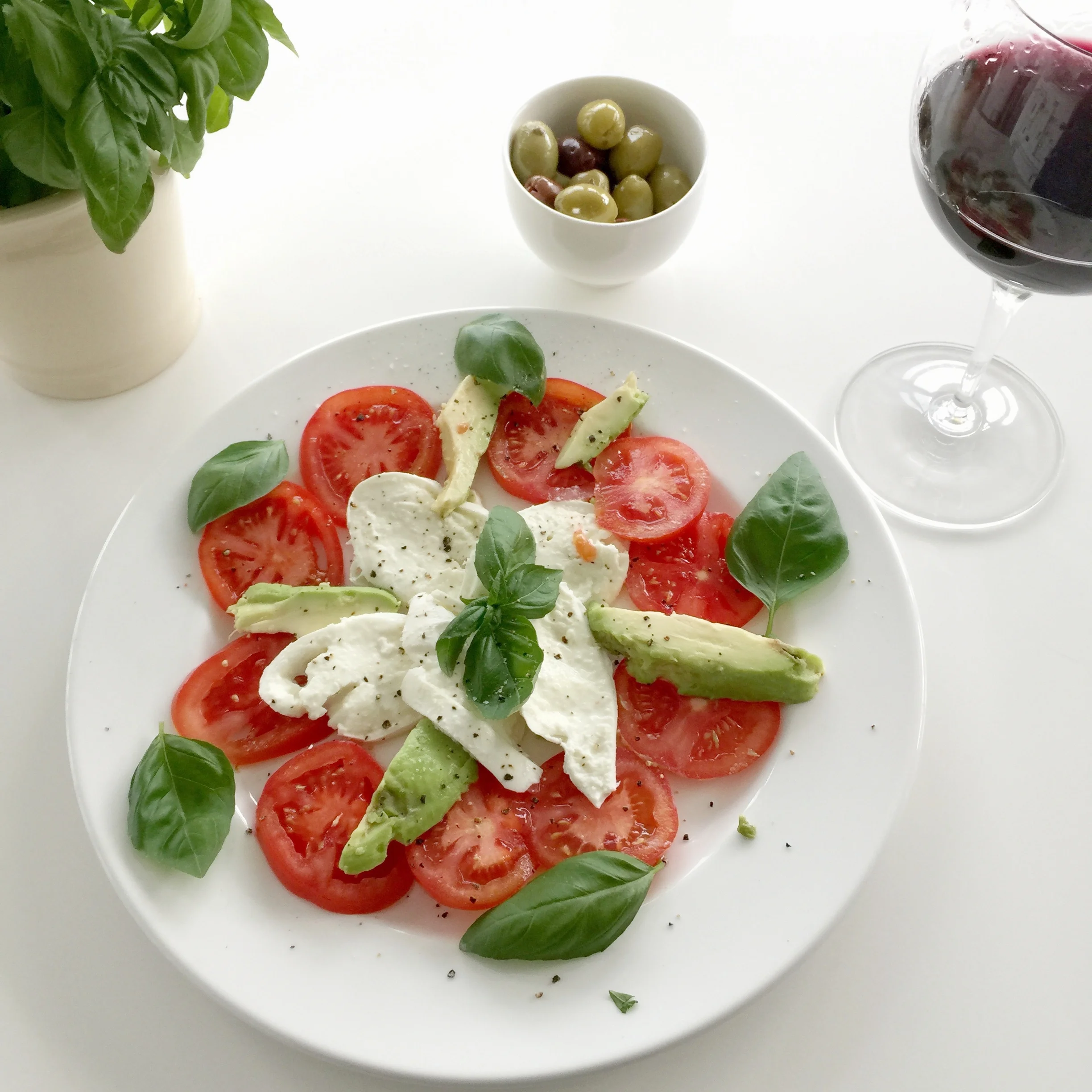 Tomato, buffalo mozzarella, avocado & basil. Yum, health on a plate!