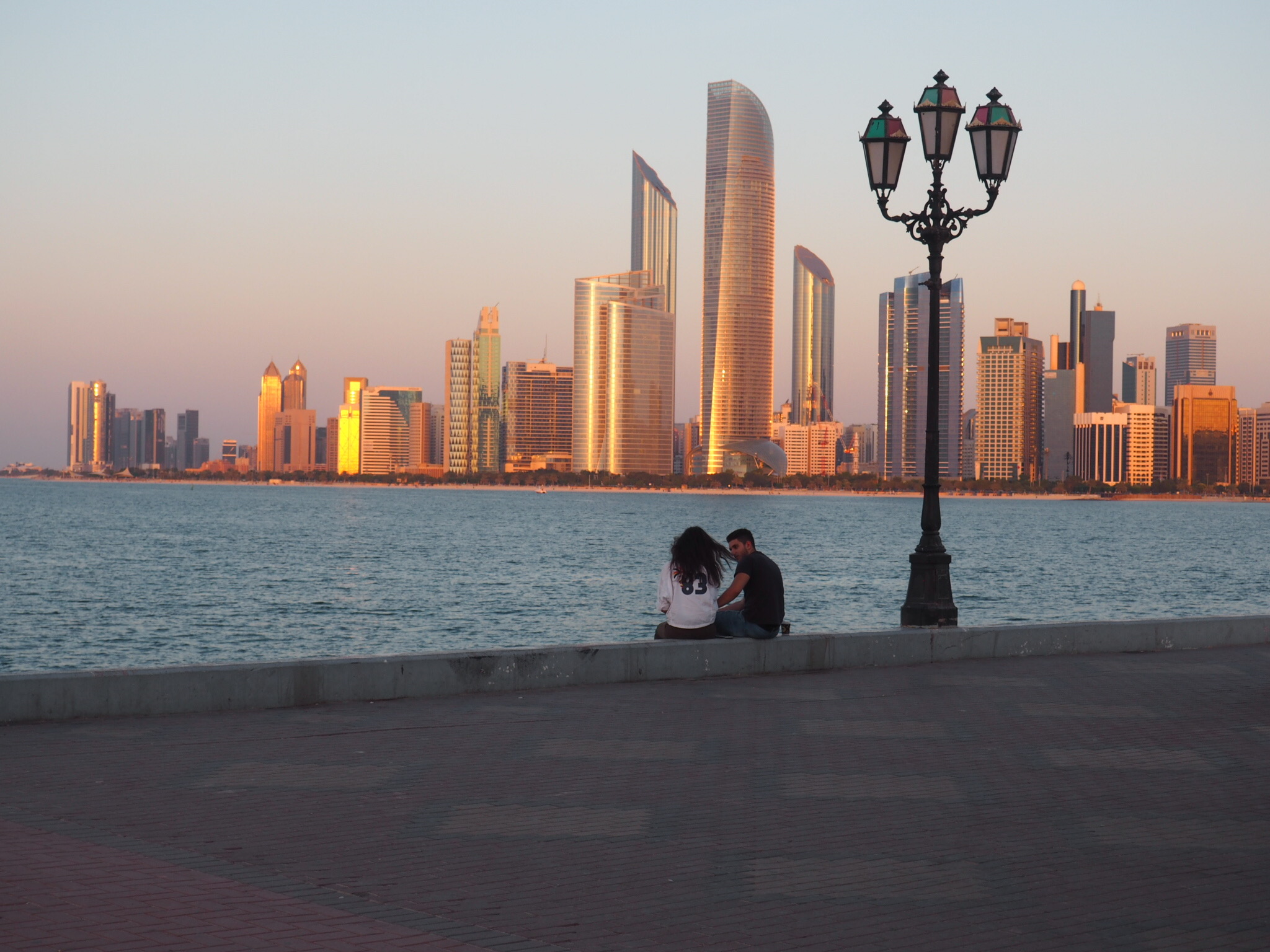 Abu Dhabi skyline at sun set.jpg