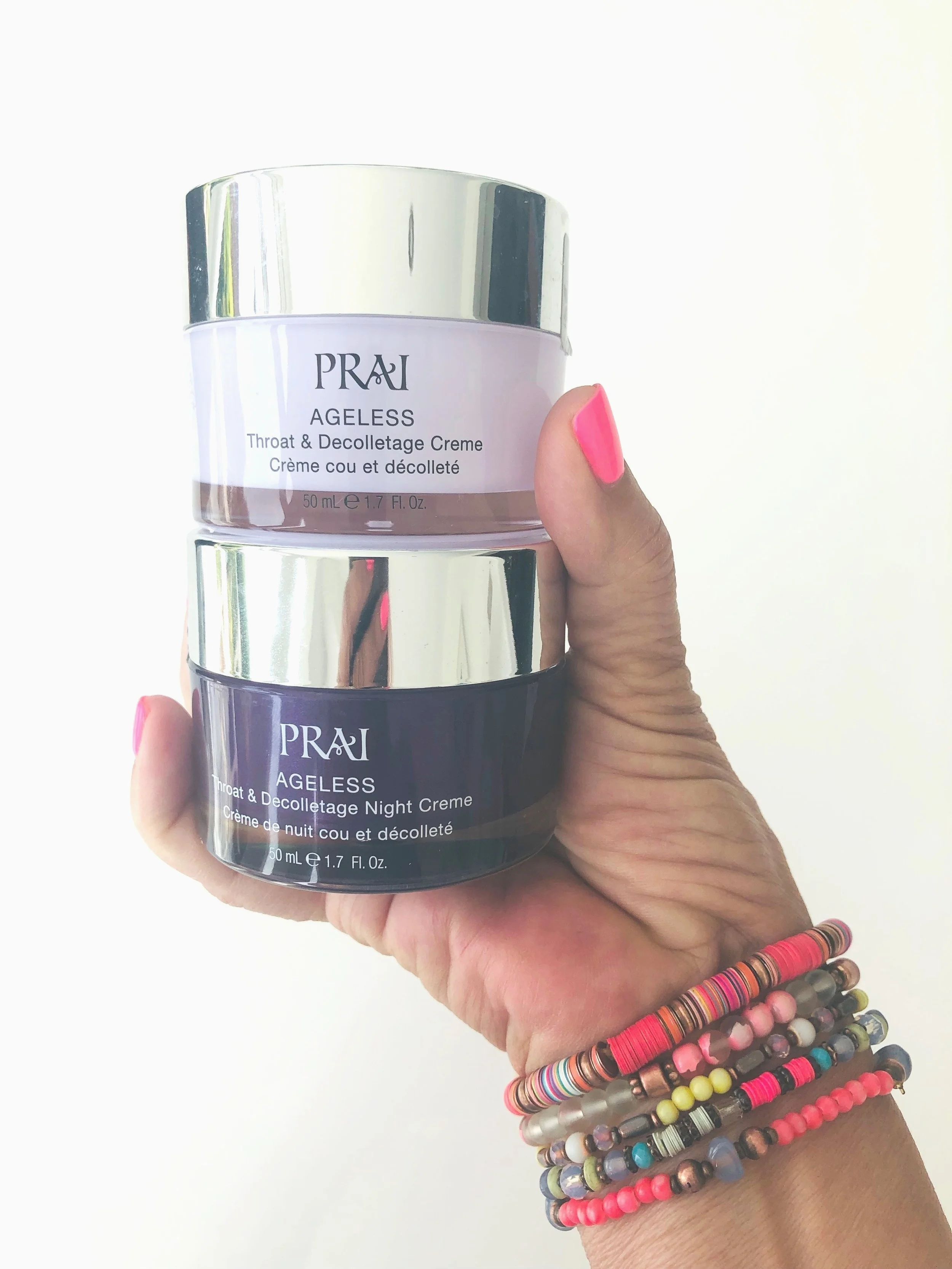 The dynamic duo: PRAI Ageless Throat & Decolletage Day Creme & Night Creme.