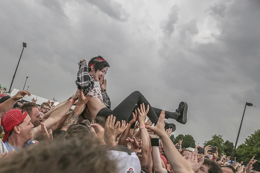 Rock-on-the-Range-woman-crowd-surfing-Harry-Acosta-Photography.jpg