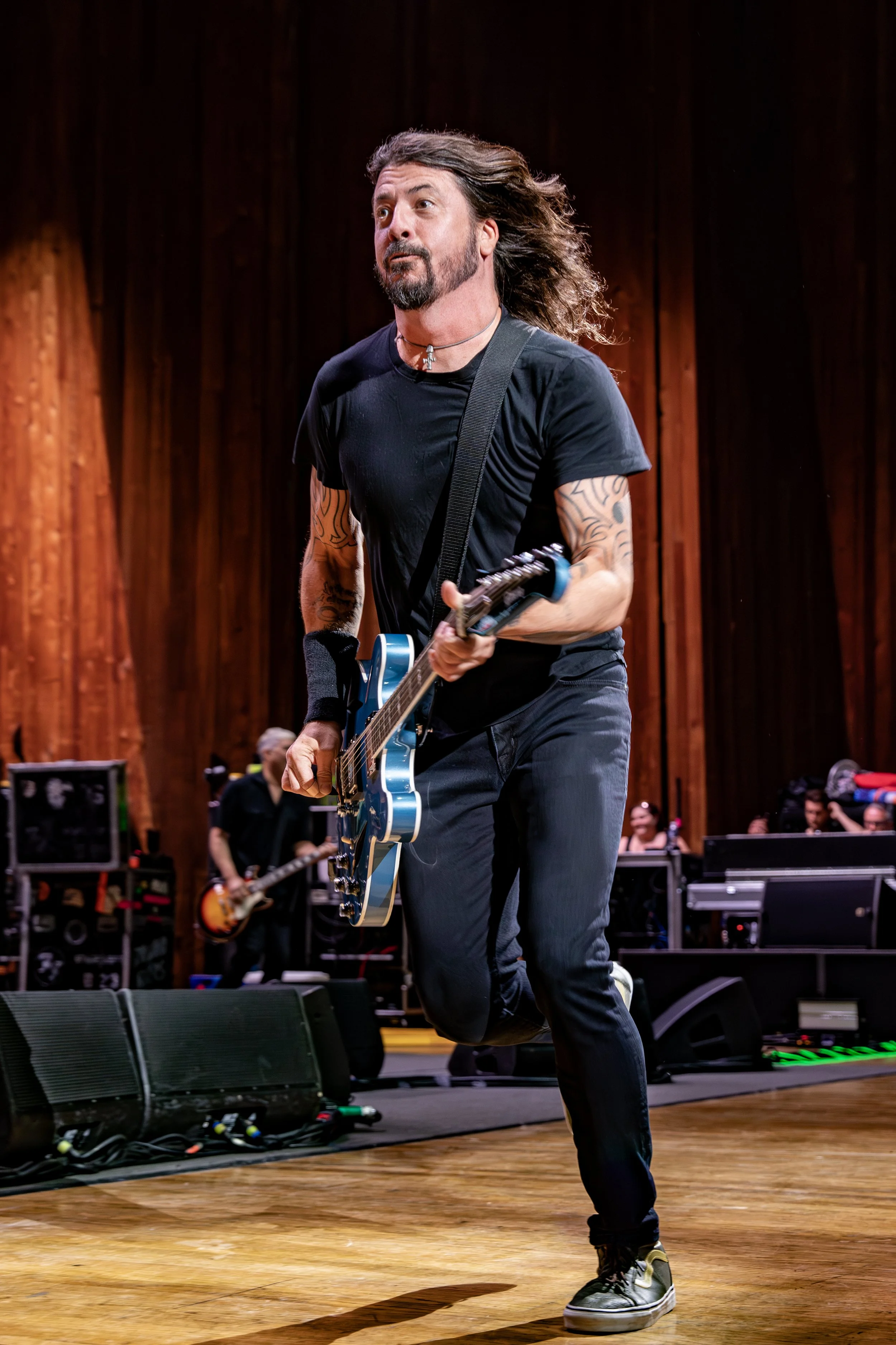Dave Grohl runs on stage live at Blossom Music Center in Cuyahoga Falls - Harry Acosta Photography