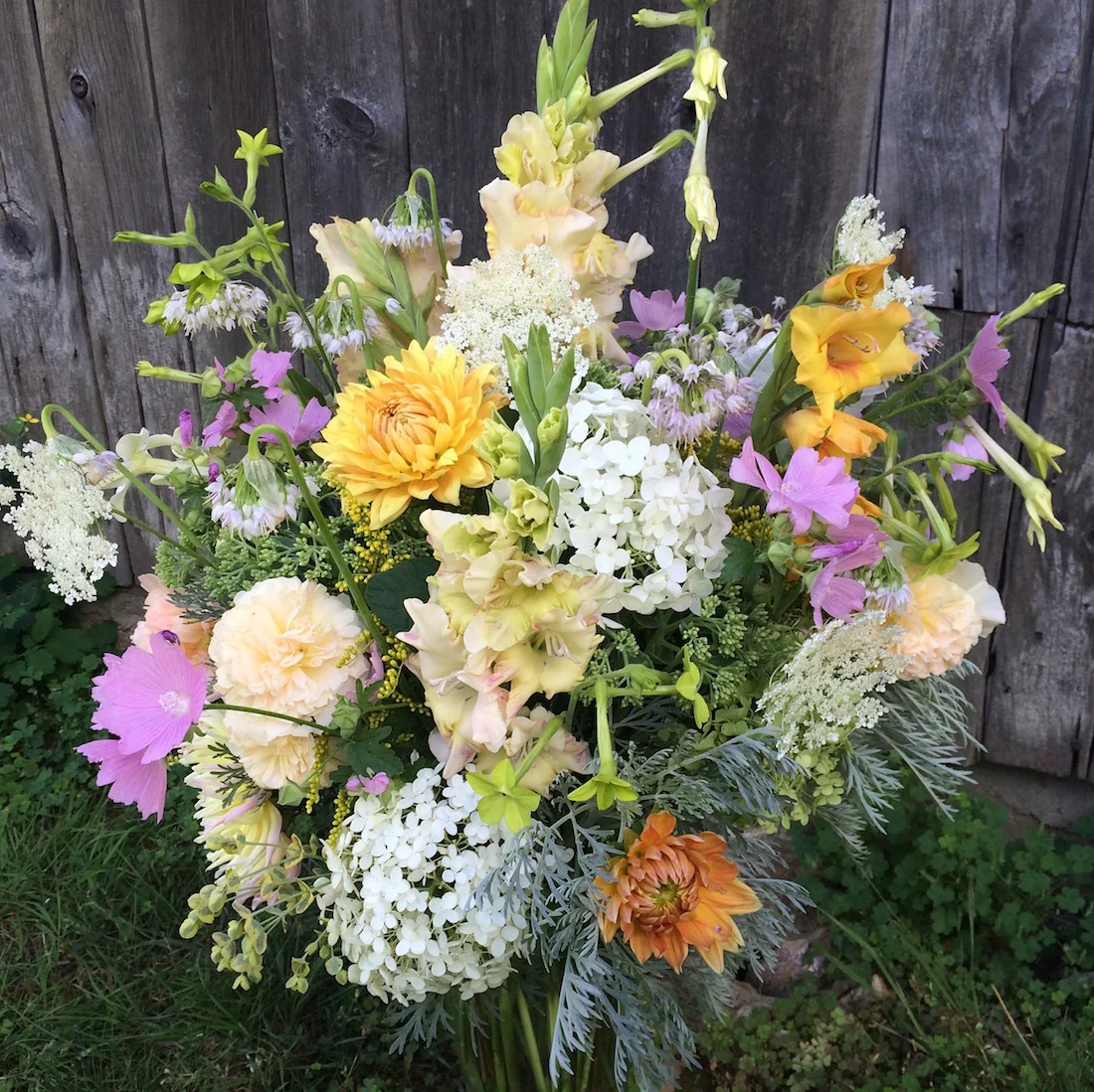 rustic wedding flower arrangement.jpg