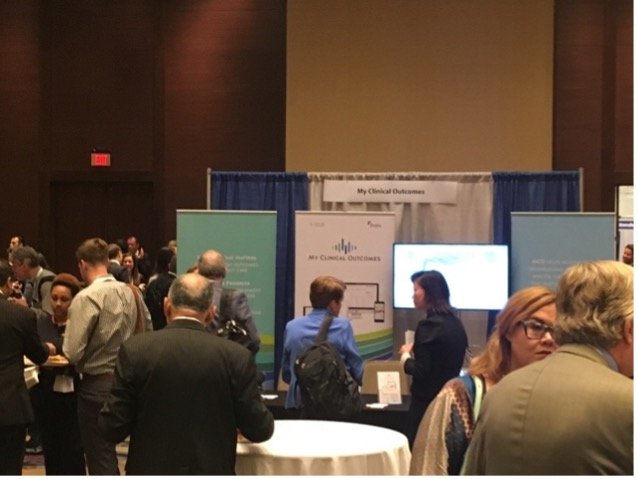 Delegates at the MCO ICHOM conference stand, Washington