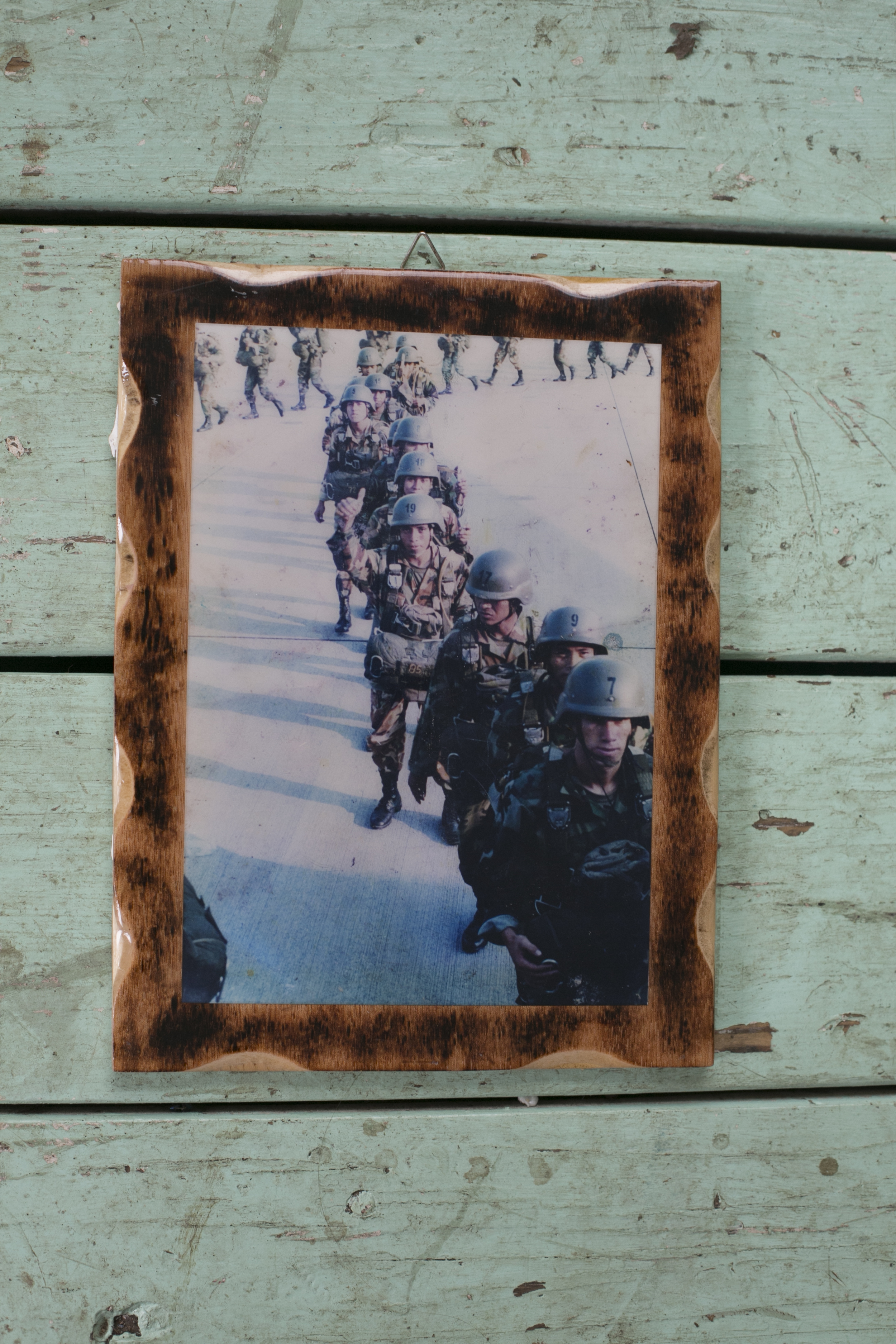 Displayed the home of Carlos Molina; a photograph featuring Carlos Molina in uniform.