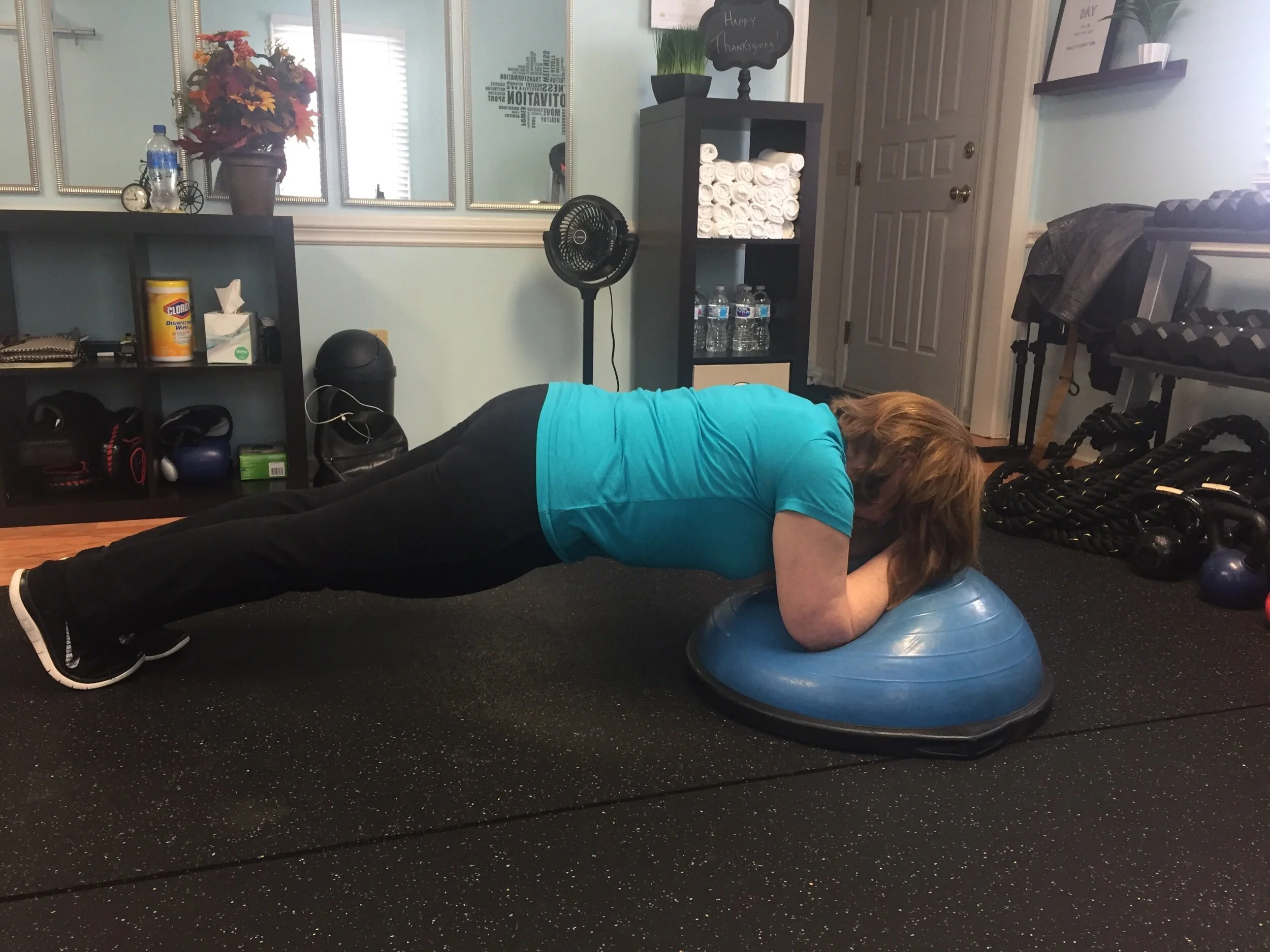 Our client Deb planking at 68 years old in 2017……