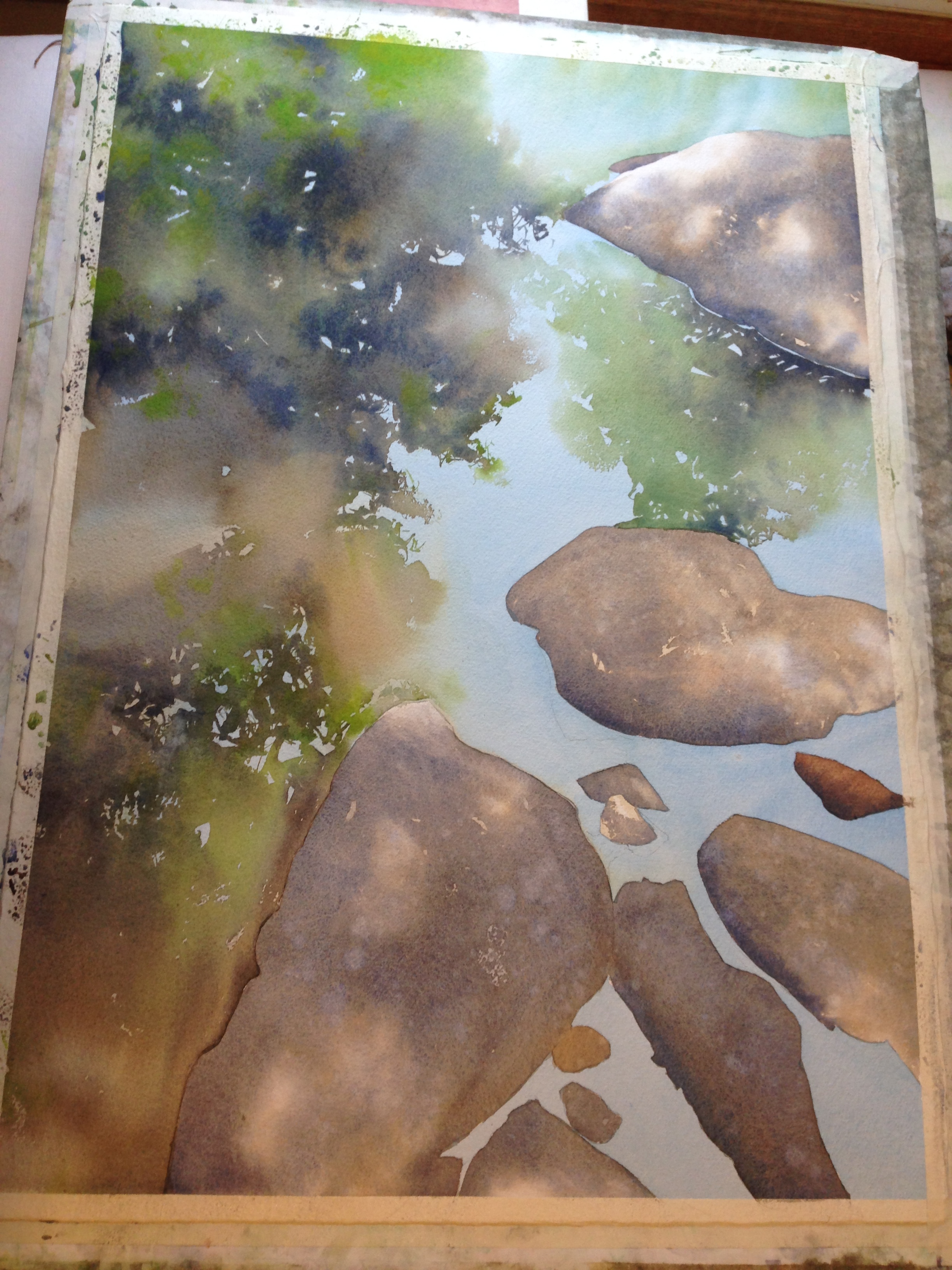 step 4- I start detailing the stones, with my first wash of ultramarine blue and burnt sienna. Yes, I'm spitting on the stones to get that speckled look. :P