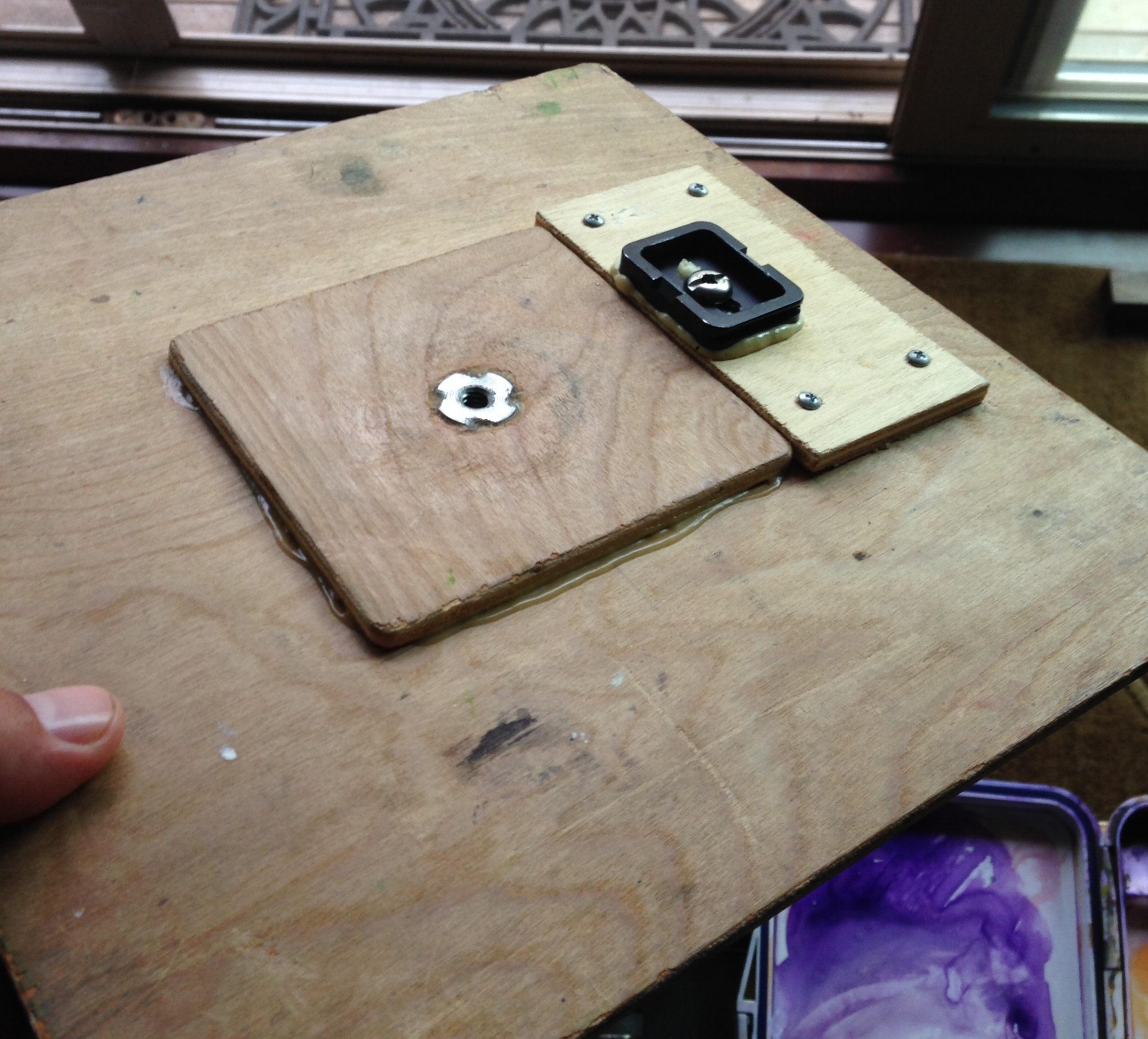the quick release is now attached 3" to the right of the old threaded hole in the center.