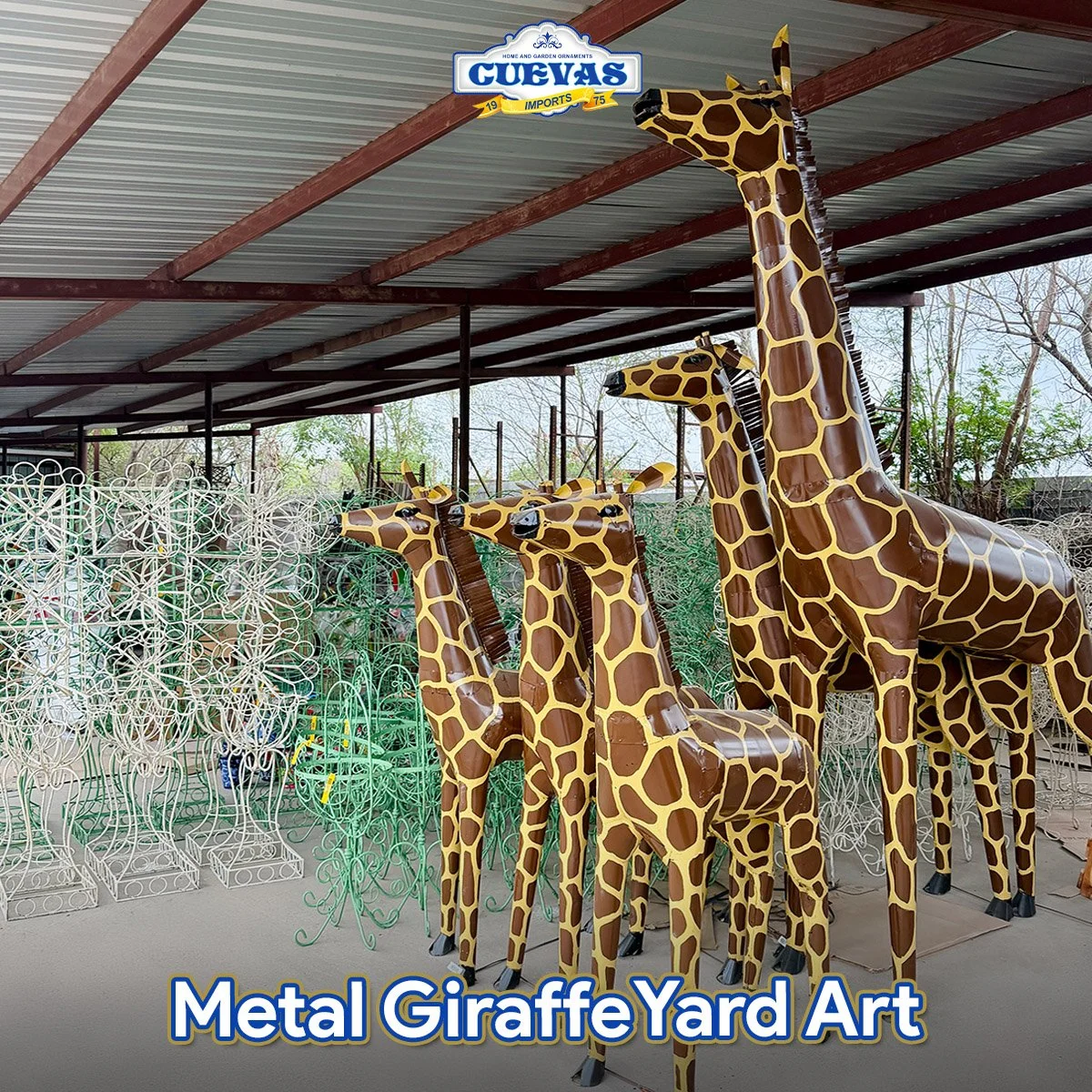 A display of metal giraffe yard art sculptures painted to resemble giraffes, set under a metal roof with a sign that reads "CUEVAS Home and Garden Ornaments Imports 1975."