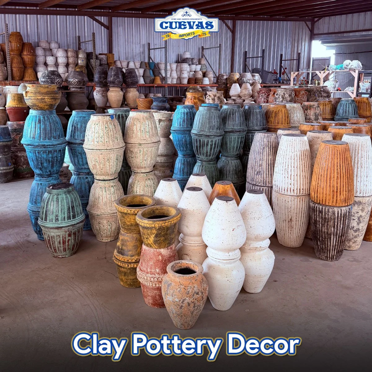 Display of various decorated clay pottery pots and vases in a warehouse or pottery shop.