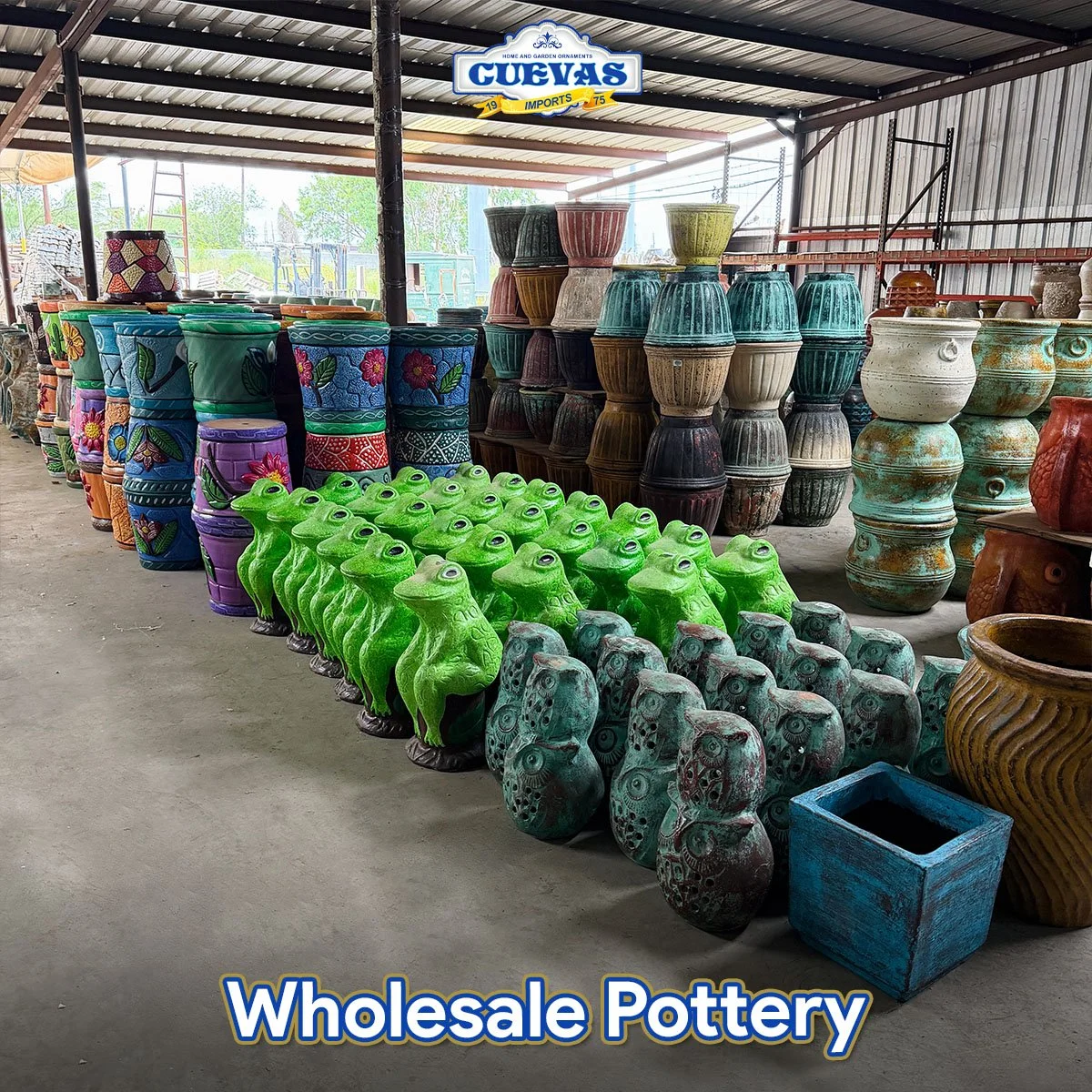 Rows of colorful decorative pottery and planters in a warehouse, including frog-shaped planters, vases, and urns, with a store sign reading 'CUEVAS Wholesale Pottery' at the top.