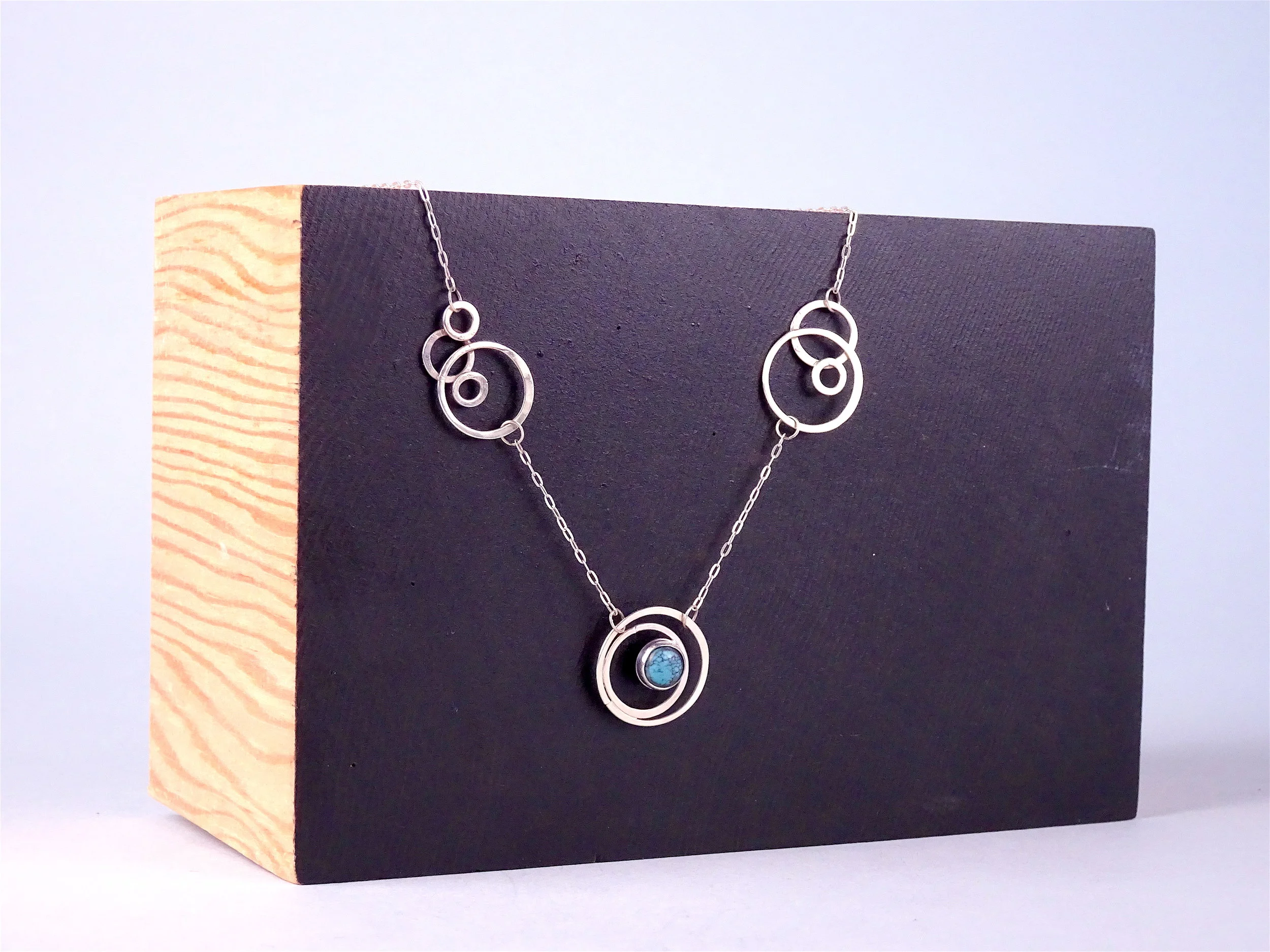 Orbiting Moons Turq 1.JPG