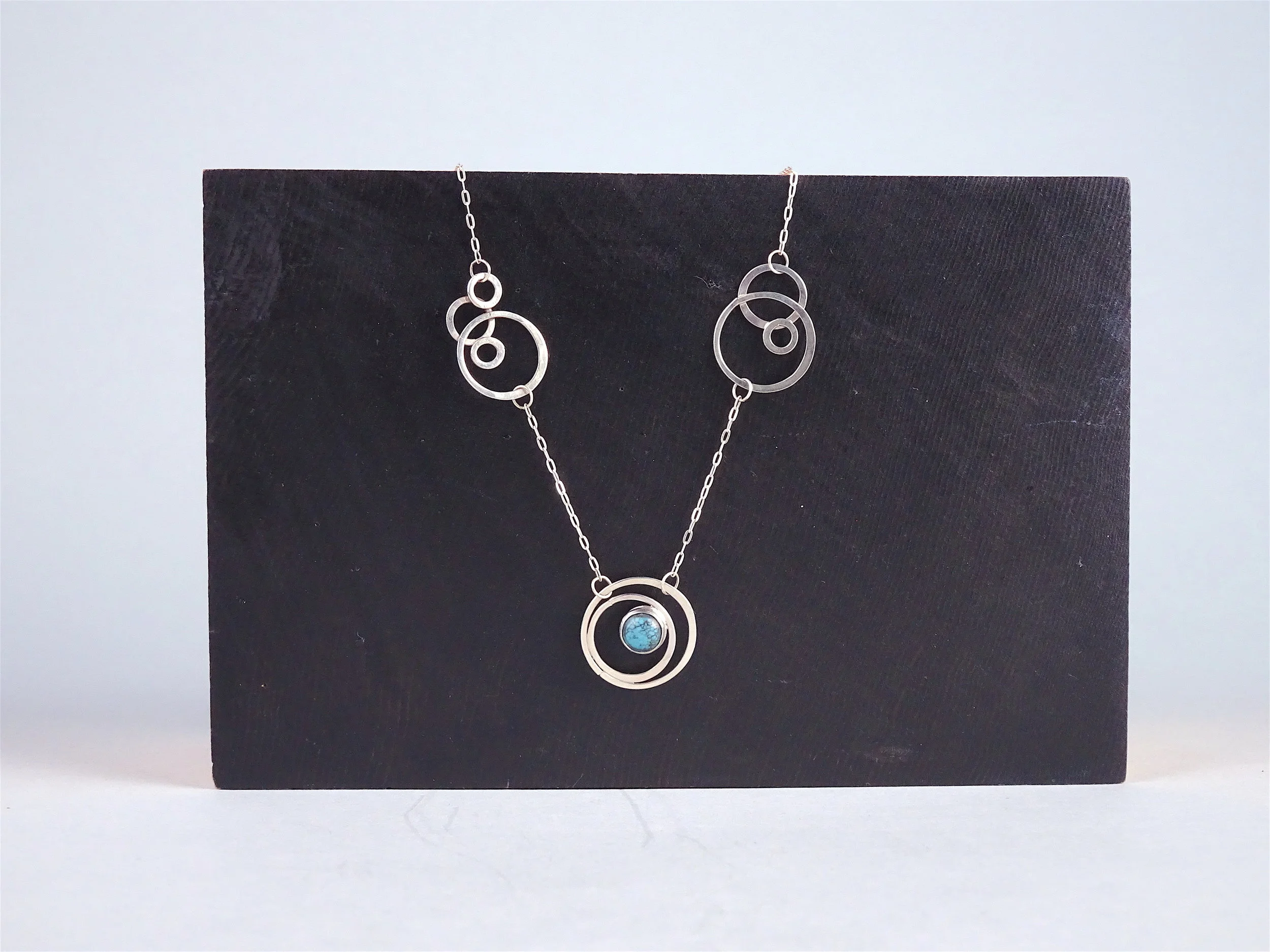 Orbiting Moons Turq 3.JPG