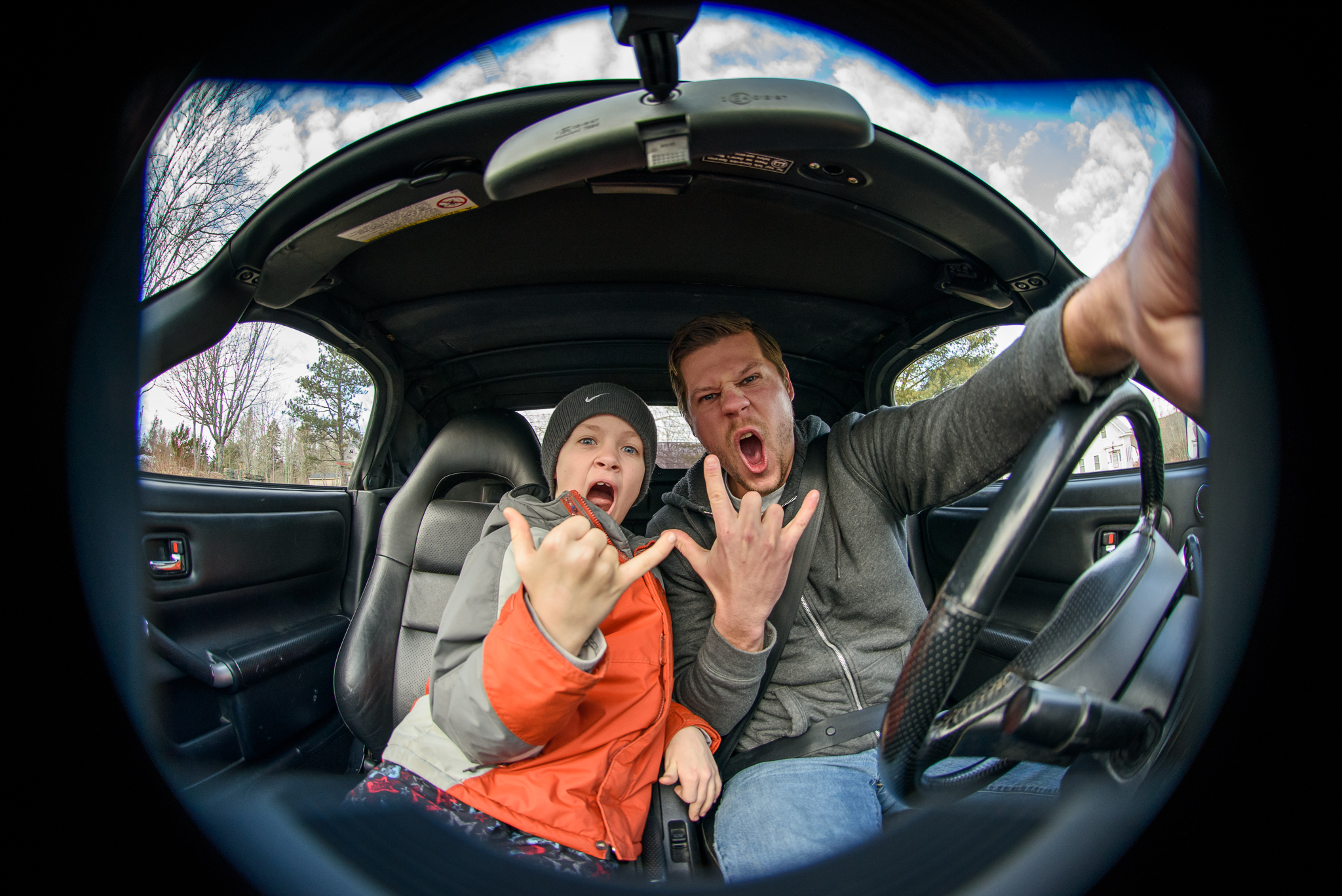 My nephew Kayden and I cruising around in my MR2 Spyder convertible. No, we were not moving during this selfie, and yes, we wore seatbelts for the ride! If am able to cram all my gear in, there's a good chance you'll see me in it when I show up for our session.