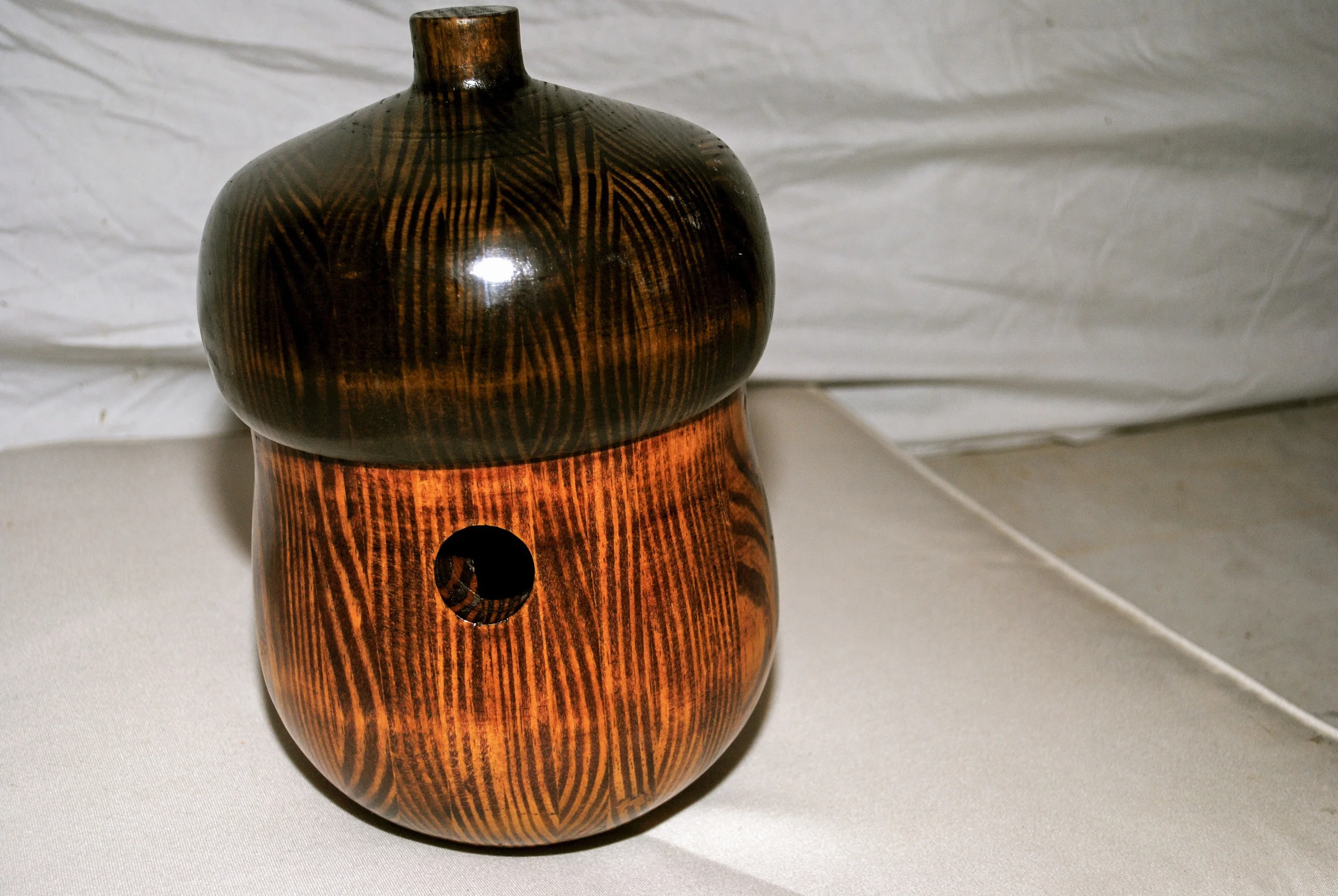  Wood turned Acorn made from recycled Henderson High School bleachers. 