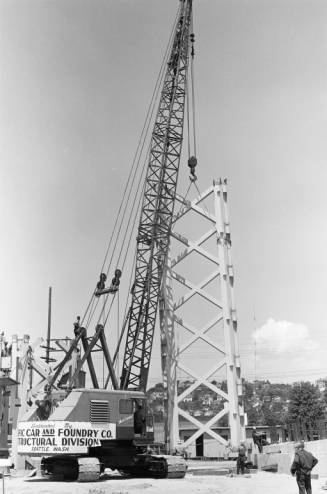 Crane_with_section_of_Space_Needle_core_ca_June_1961.jpg