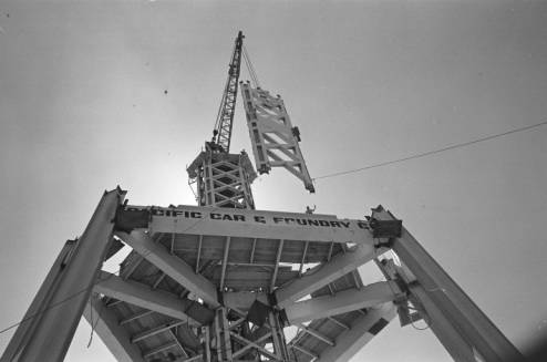 Derrick_raising_section_of_Space_Needle_core_ca_August_1961.jpg