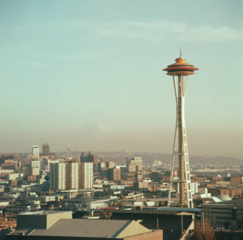 View_south_to_Space_Needle_downtown_and_Mount_Rainier_1962.jpg