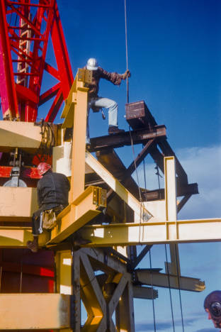 Workers_at_base_of_Space_Needle_torch_ca_December_8_1961.jpg