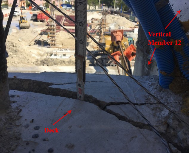 NTSB description: Location: Diaphragm II, west side directly adjacent to vertical member 12, top deck view of crack, looking to the north. Time stamp: March 13, 2018, at 11:16:50 a.m., labels added by the NTSB. (Source: Munilla Construction Manageme