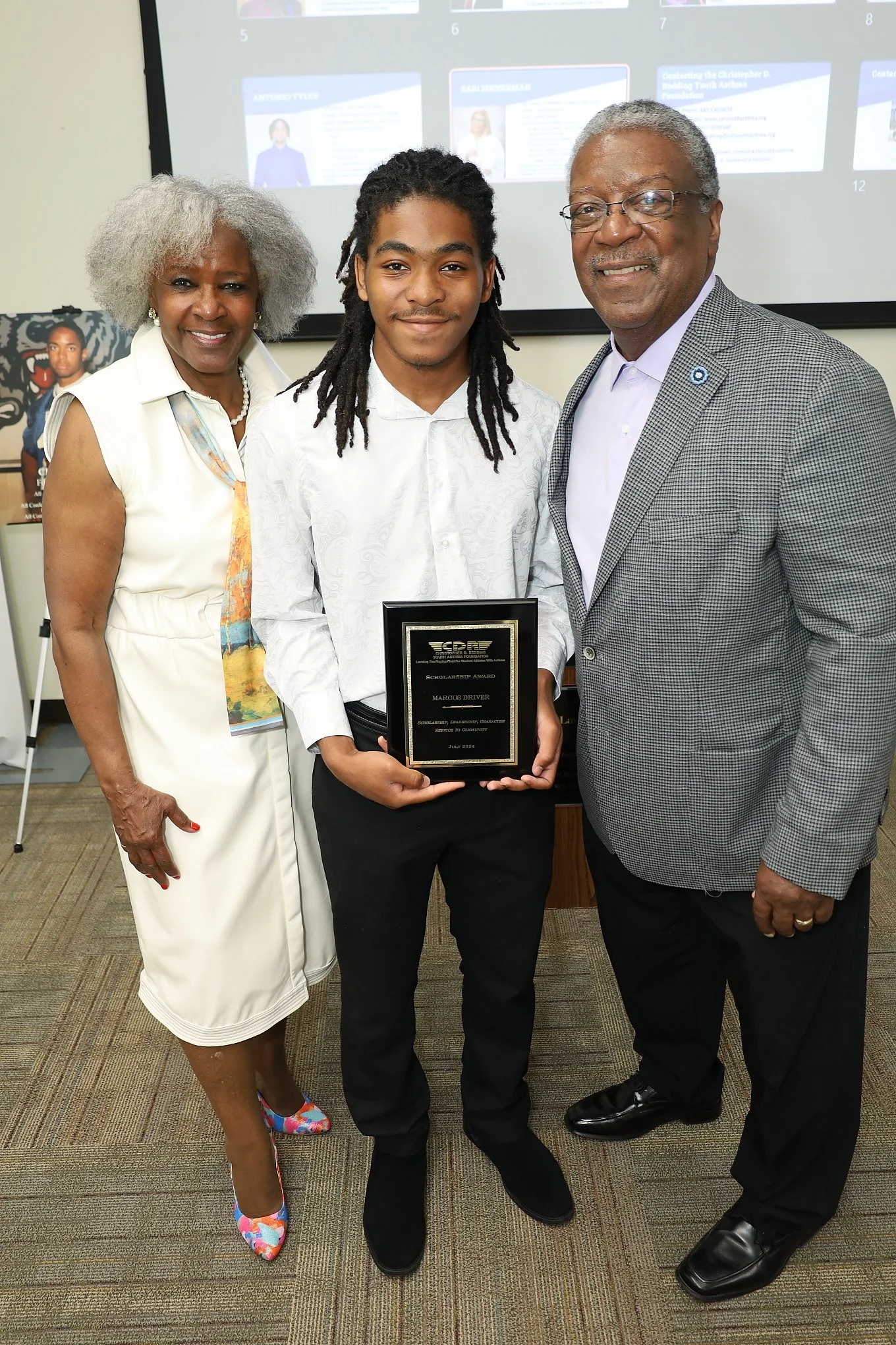 Michael and Helen Redding with 2024 Scholarship Recipient.jpeg