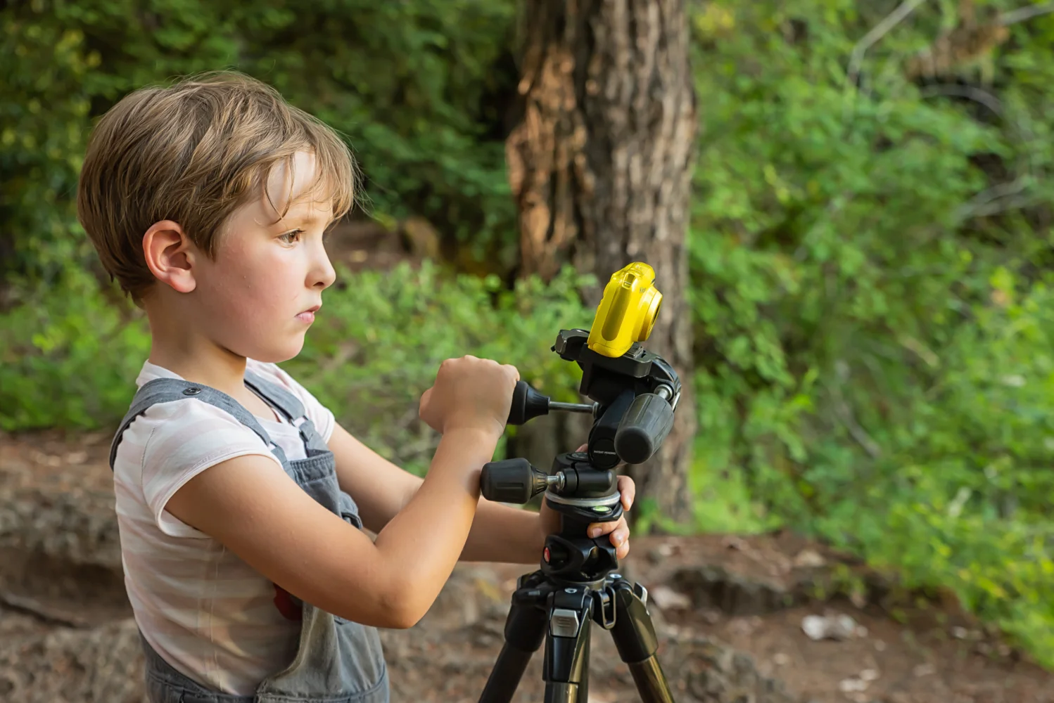 The apple does not fall far from the tree … my daughter adjusting her comp at a Rogue River waterfall