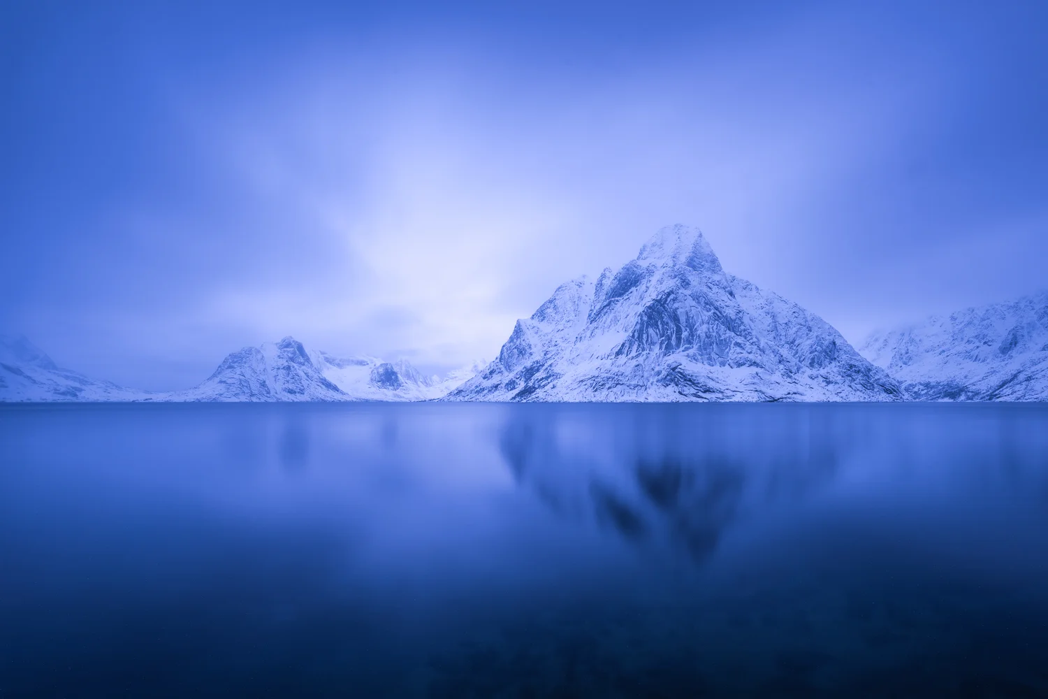 When it takes a long time … it might take you closer to the essence of a place. A three-minute exposure of the Reinefjord creates a reduced synthesis of light, place, silence, and time.