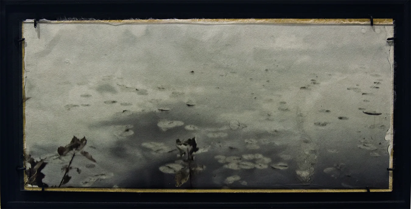 “Setback #8" 7 ¼" X 14 Wet plate, digital, film transfer on clear glass, backed with handmade Lakota paper and hand painted, metallic, gold acrylic size includes frame