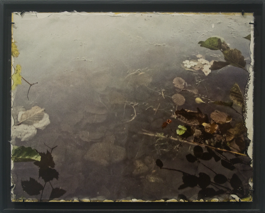 “Setback #16" 12 ½" X 15 ½" Wet plate, digital, film transfer on clear glass, backed with handmade Lakota paper and hand painted, metallic, gold acrylic size includes frame