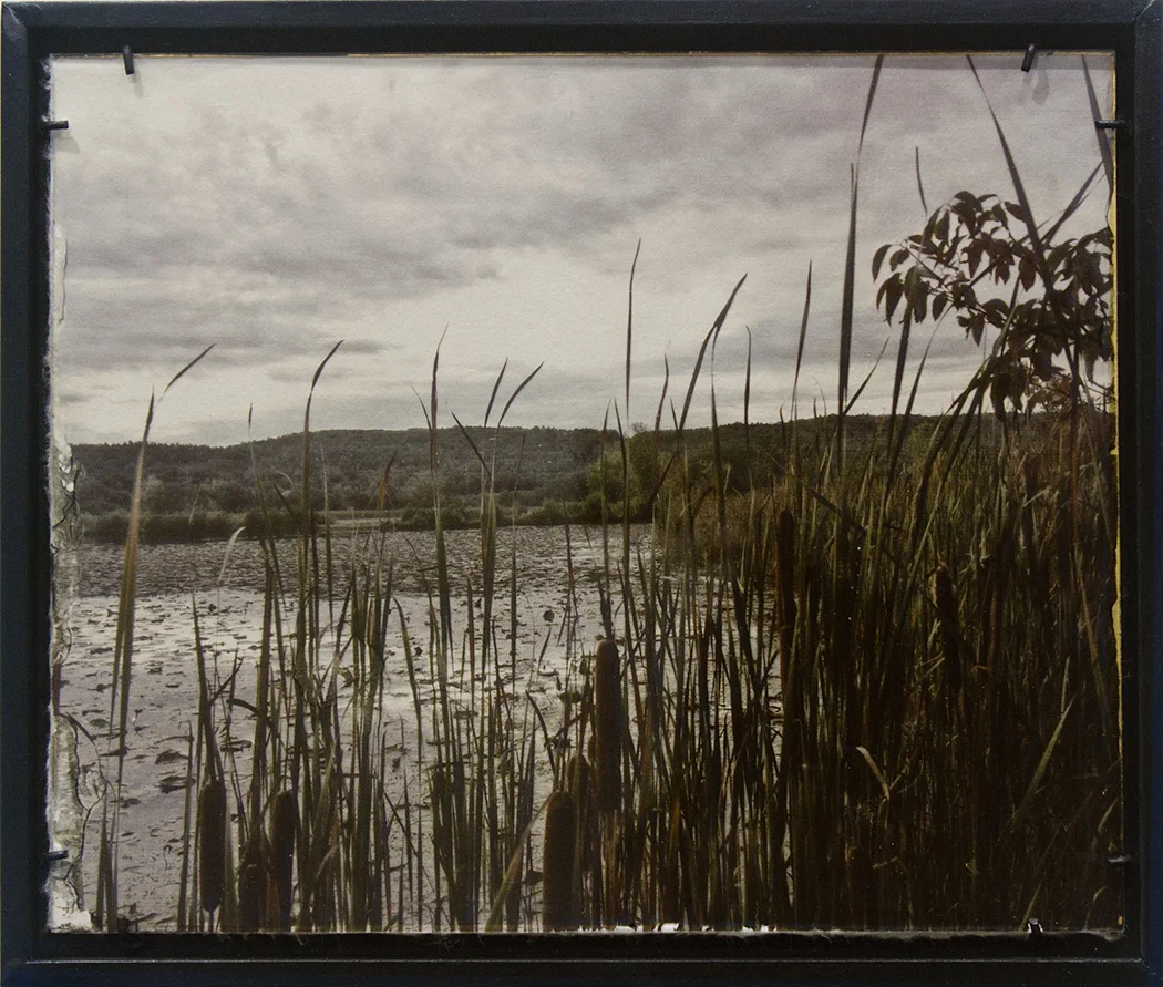 “Setback #12" 10 ⅞" X 9 ½" Wet plate, digital, film transfer on clear glass, backed with handmade Lakota paper and hand painted metallic, gold acrylic size includes frame