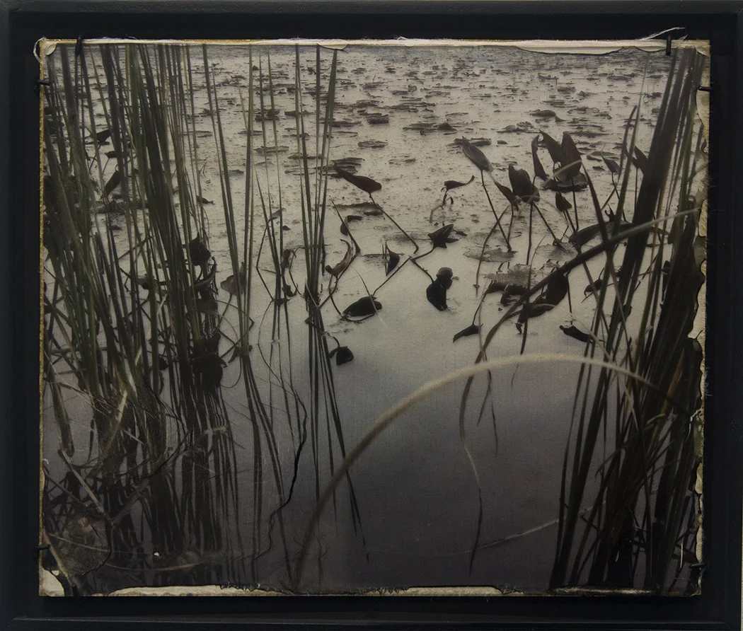 “Setback #14" 11 ⅛" X 13 ⅞ " Wet plate, digital, film transfer on clear glass, backed with handmade Lakota paper and hand painted, metallic, gold acrylic size includes frame