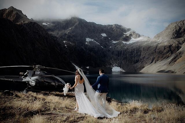 Lauren and JP on a quick wedding day detour in the mountains. This stunning wedding story and location shoot is up on our site now ⚡️ .
.
.
.
.
#chasewild #chasewildphotos #lakeerskine #onefinedayweddings #heliwedding #helicopterwedding #nzwedding #n