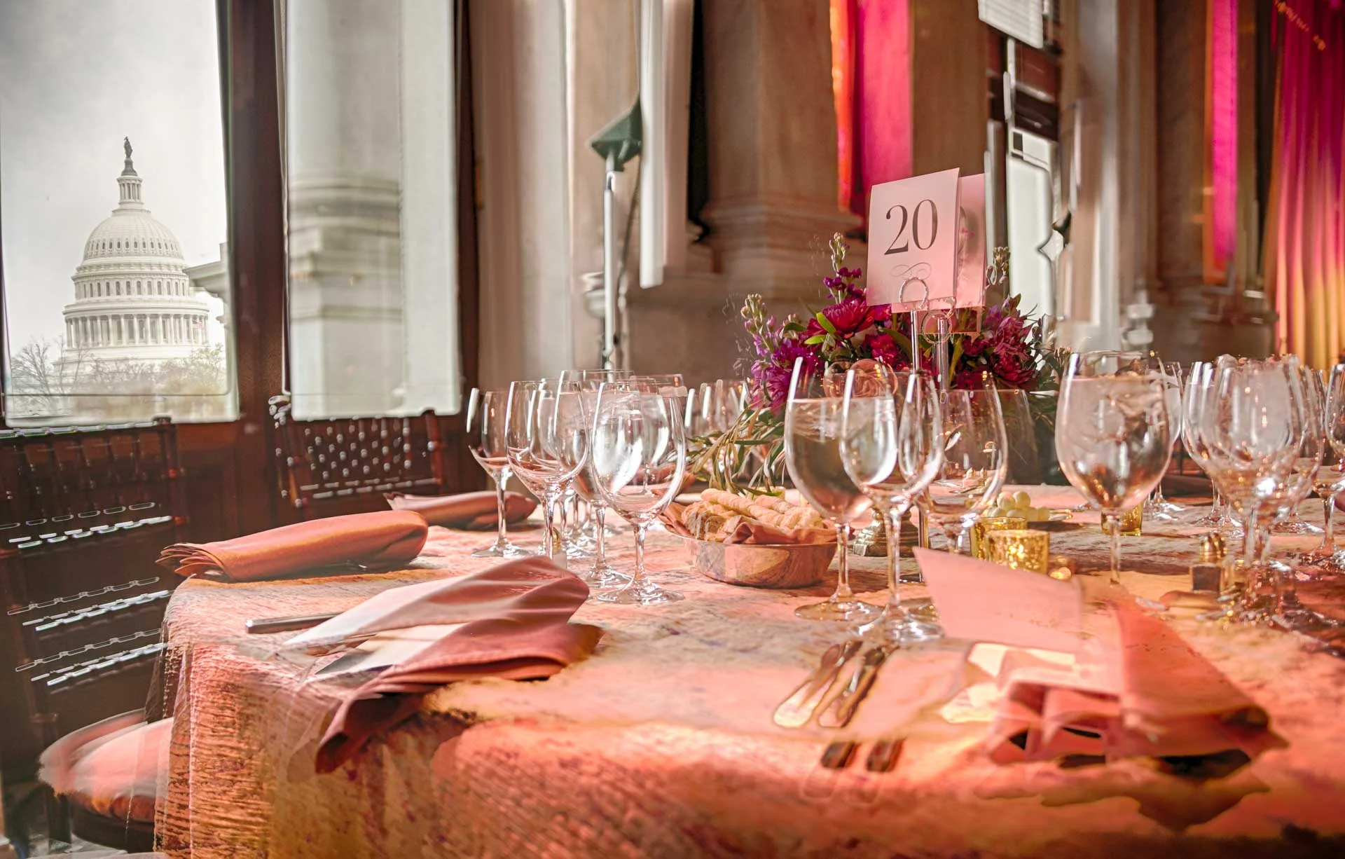 The view of the capital is amazing, but the view inside of the Library of Congress is so jaw dropping you just can't believe your eyes. These out of town clients were lucky enough to dine in The Great Hall of the Thomas Jefferson Building. Once again the table set up was perfection. A warm terra cotta and gold with the pops of color coming from the flowers. Photo above and below by David Keith Photography Catering and rentals by Occasions Caterers