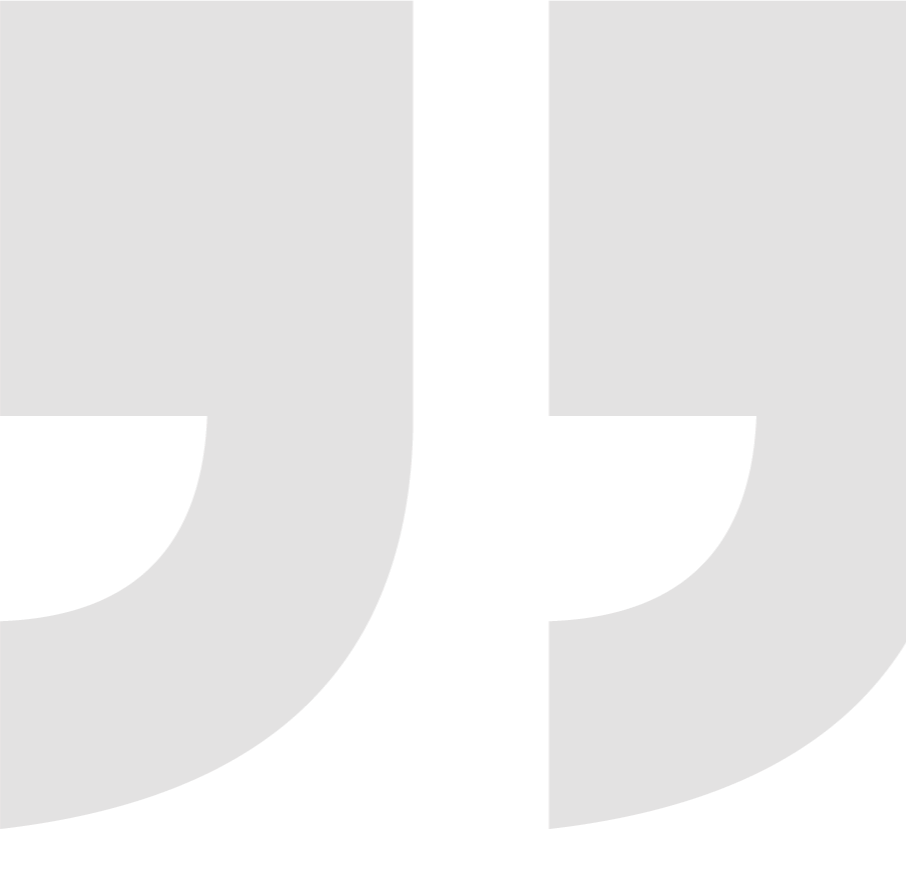 Close-up of a logo with black and white geometric shapes forming the letter U and J.