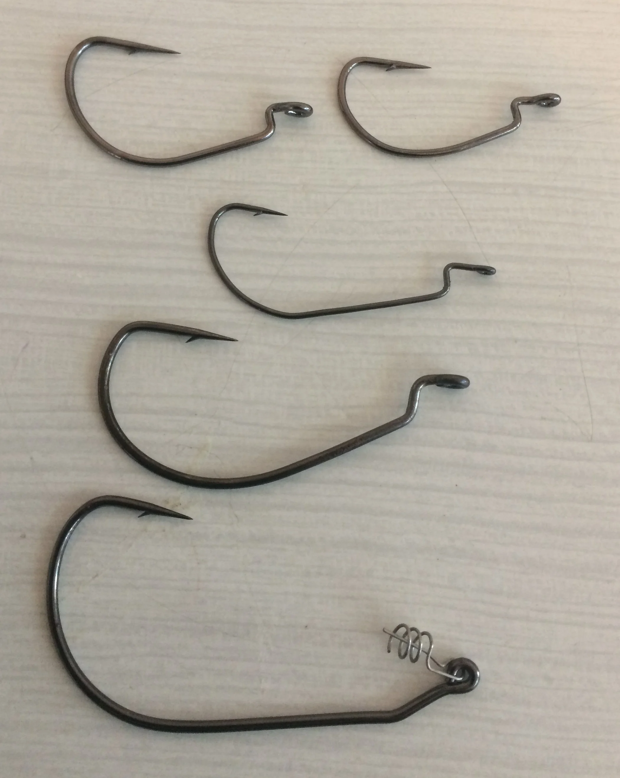 **Hooks** (Be careful and look at the pictures shown here. Not all offset hooks work with every lure. Watch in particular for gape length as hooks of the ‘same size’ often have different gape lengths. You want long, wide gapes and also, not hooks where the point turns back in on itself).