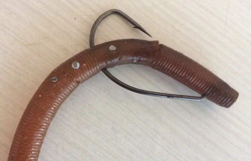 Any weight you add must not interfere with the ability of the hook coming through the plastic on a take. This is also where lubing the hook bend/plastic intersection helps.