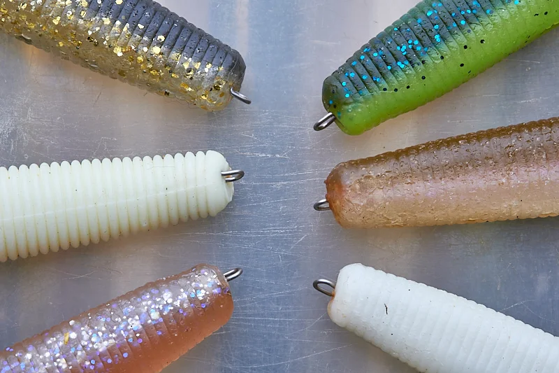 A way to carry a bunch of different soft plastics, but without having to rig them all on a bunch of weedless hooks - one hook to rule them all?
