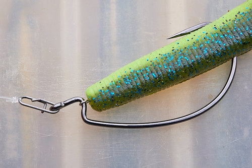 A way to carry a bunch of different soft plastics, but without having to  rig them all on a bunch of weedless hooks - one hook to rule them all? —  Henry Gilbey