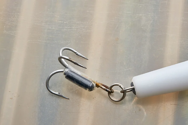 An interesting way of adding a rattle to a silent surface lure, but does it even make a difference?