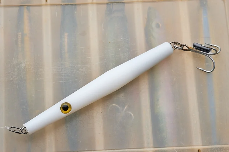 An interesting way of adding a rattle to a silent surface lure, but ...