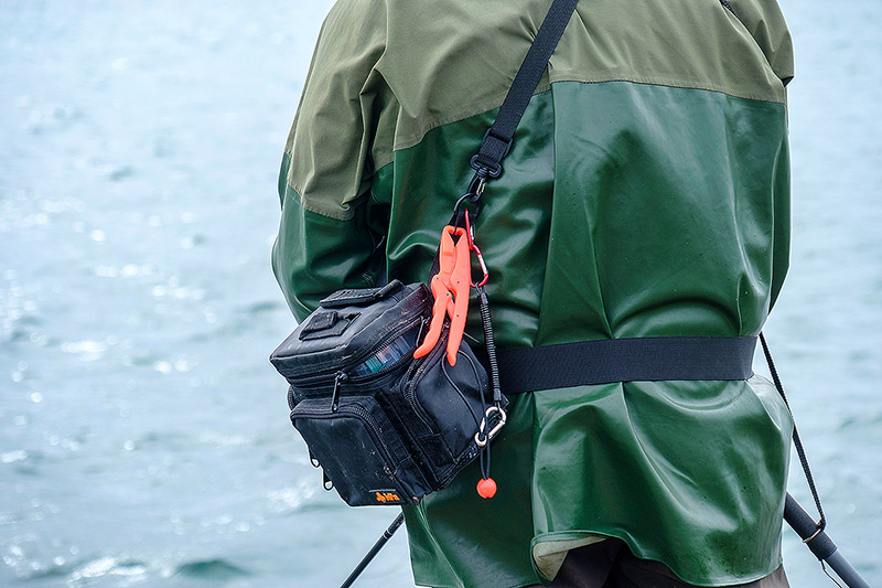 Seven years with the same “carrying lures and having them close to hand  while I am fishing” system and I still can't find a better alternative -  the HPA Chest Pack —