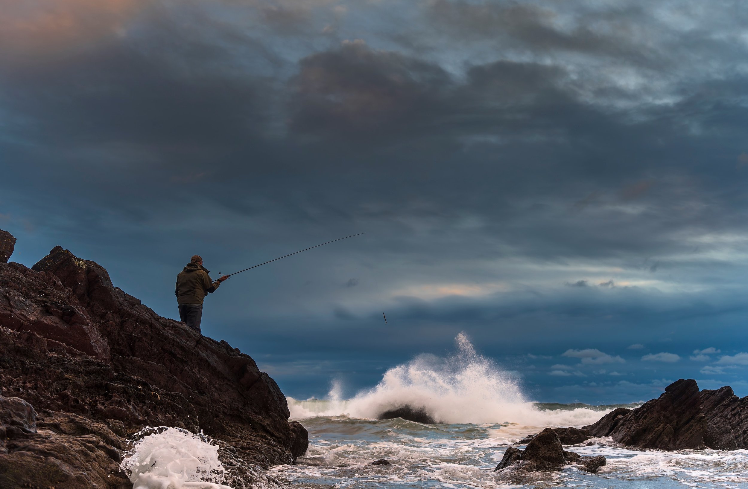 Catching bass between the biggest lines of swell rolling in — Henry Gilbey