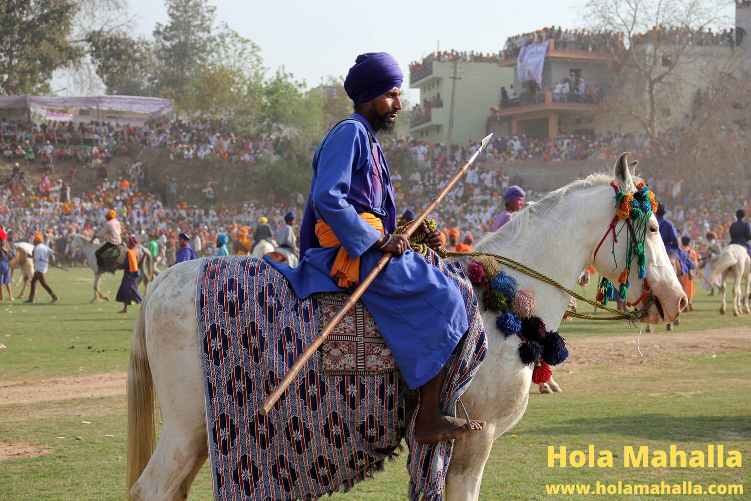 WM IMG_2219 singh on  horse lots of people in background auto contrast face lighter.jpg