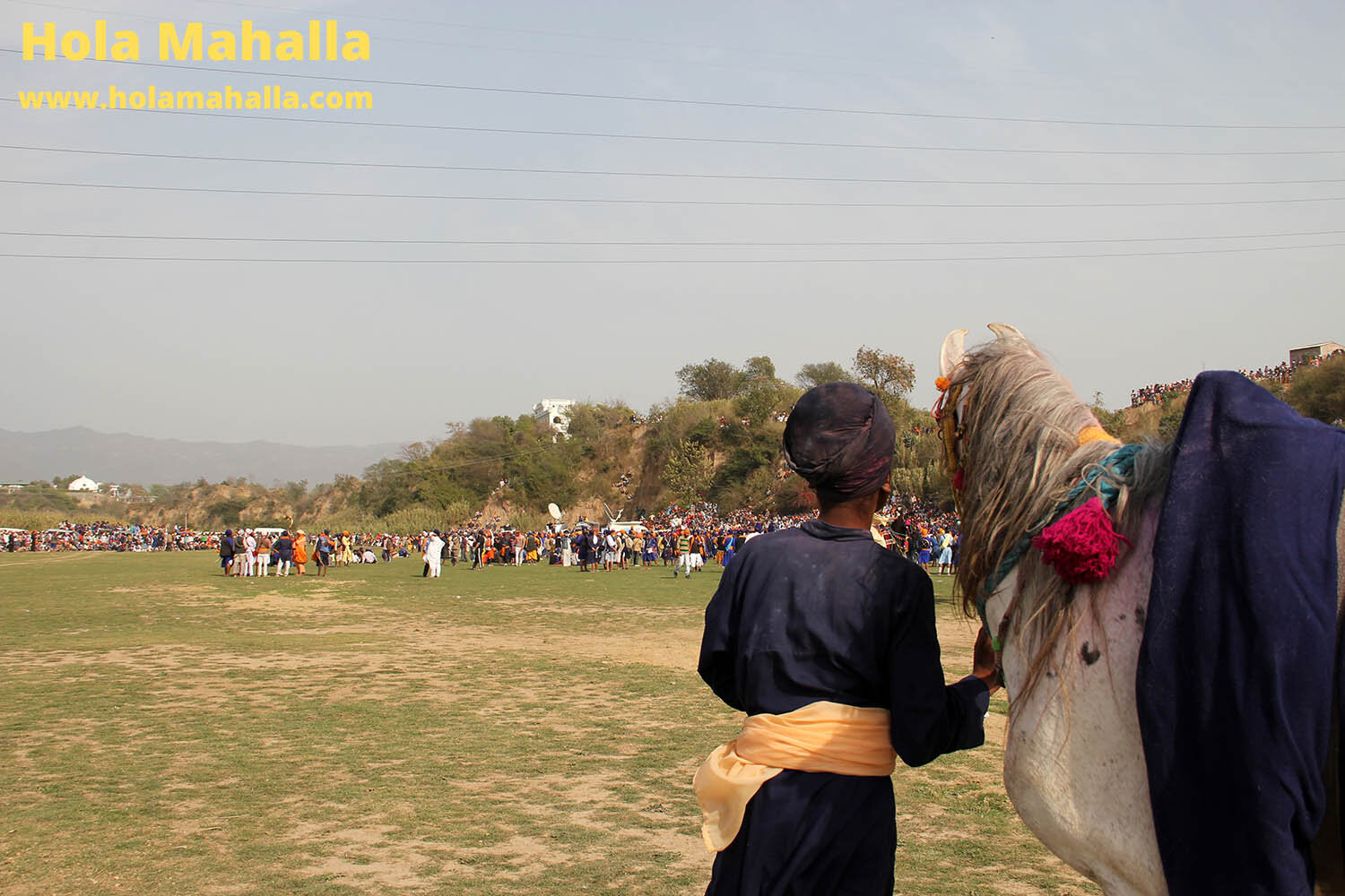 WM IMG_4514 Singh kid with horse cowd in background auto contrast.jpg