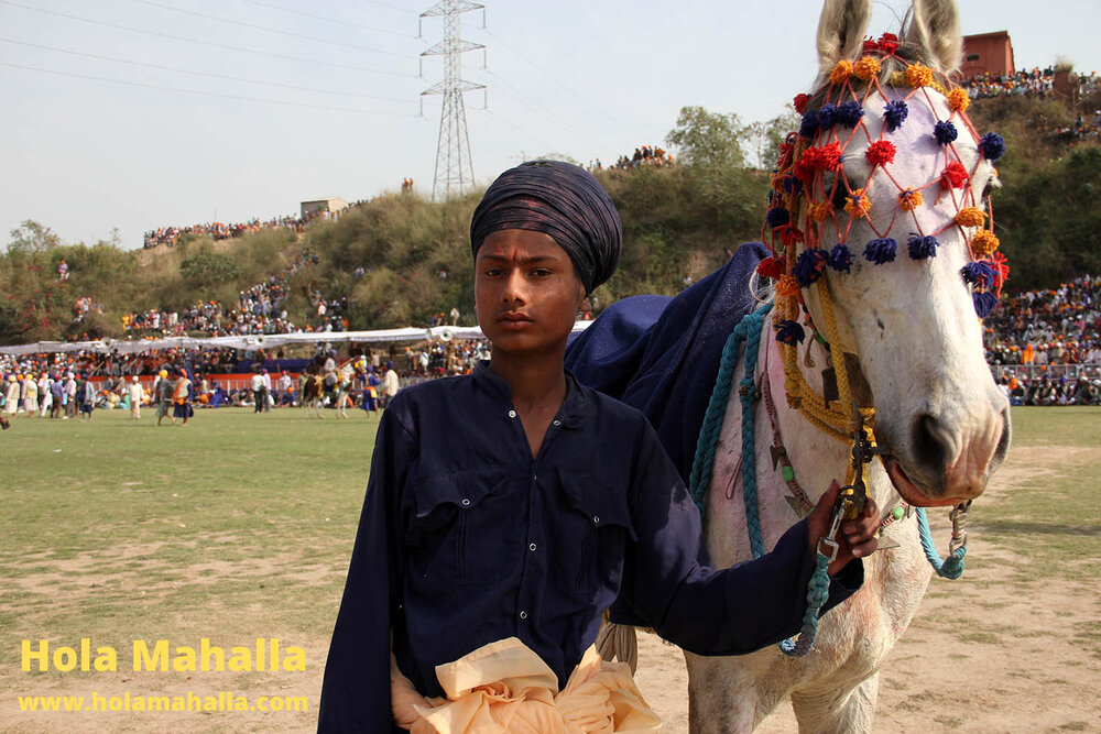 WM IMG_4508 Singh kid with horse cowd in background auto contrast.jpg