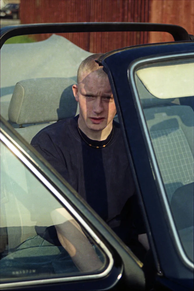 CL Sheet 27 Neg 13. Lad in Car. Lingfield Close.jpg.jpg