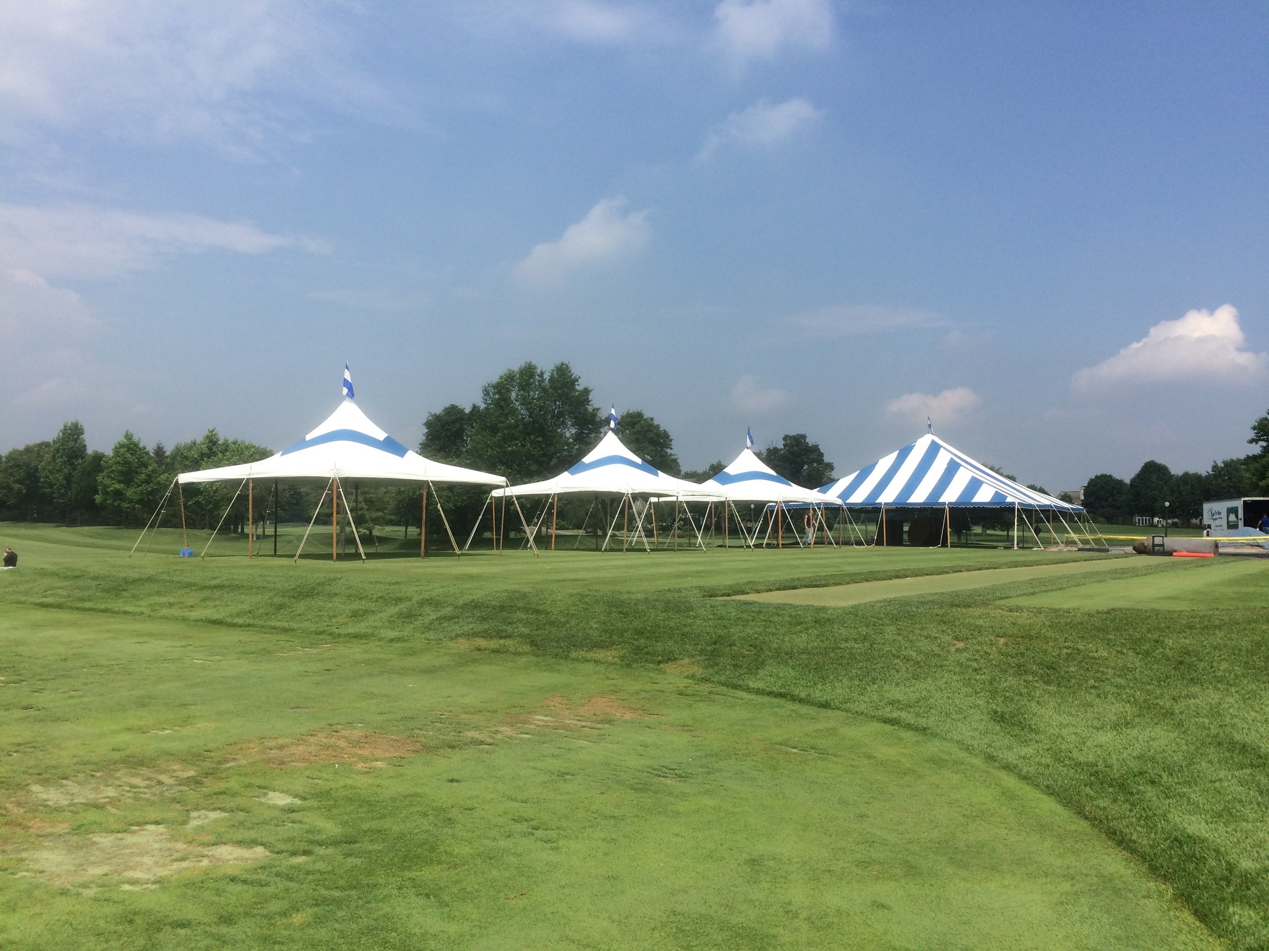 40' wide and 20x20 blue tents