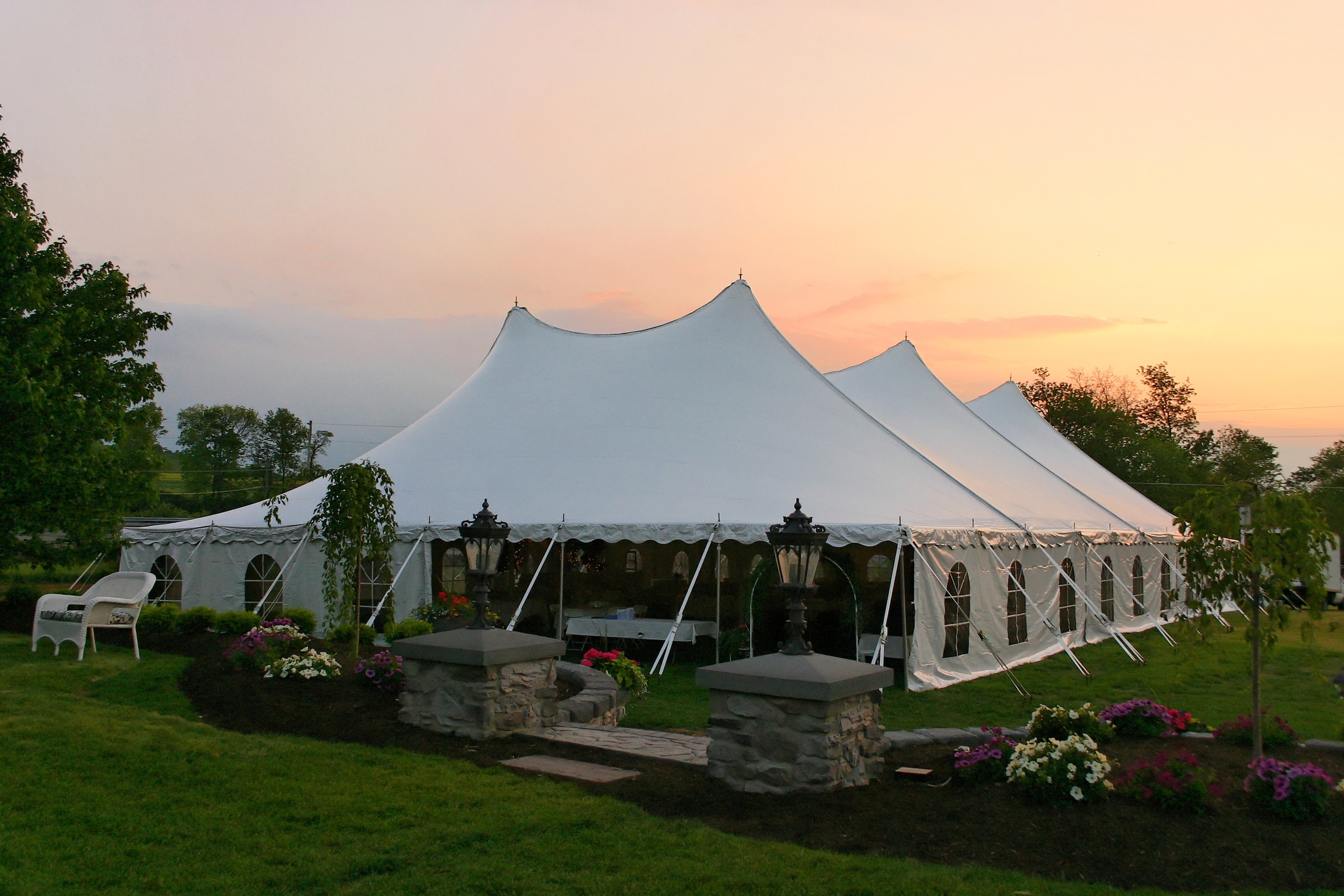 White wedding tent with cathedral window sidewall