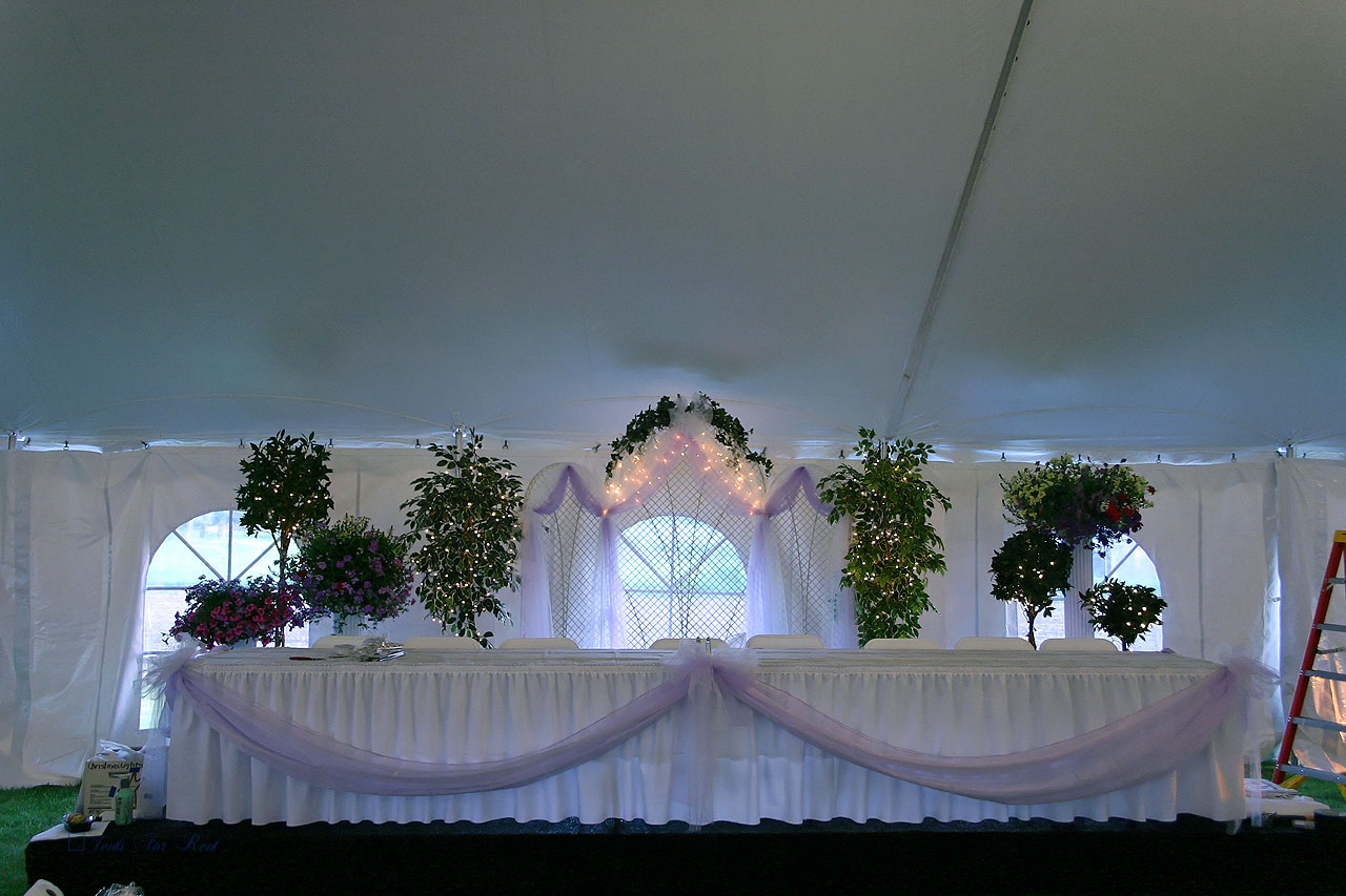 White wedding tent with cathedral window sidwall